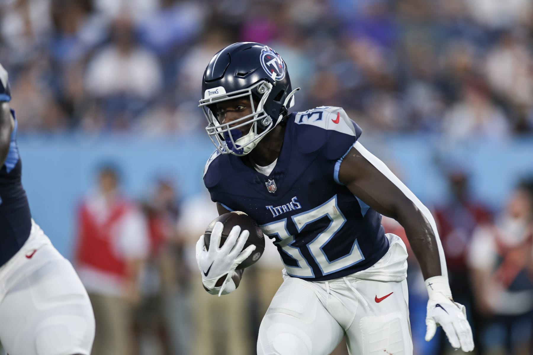 NASHVILLE, TENNESSEE - AUGUST 25: Tyjae Spears #32 of the Tennessee Titans rushes with the ball against the New England Patriots during the preseason game at Nissan Stadium on August 25, 2023 in Nashville, Tennessee. (Photo by Silas Walker/Getty Images)