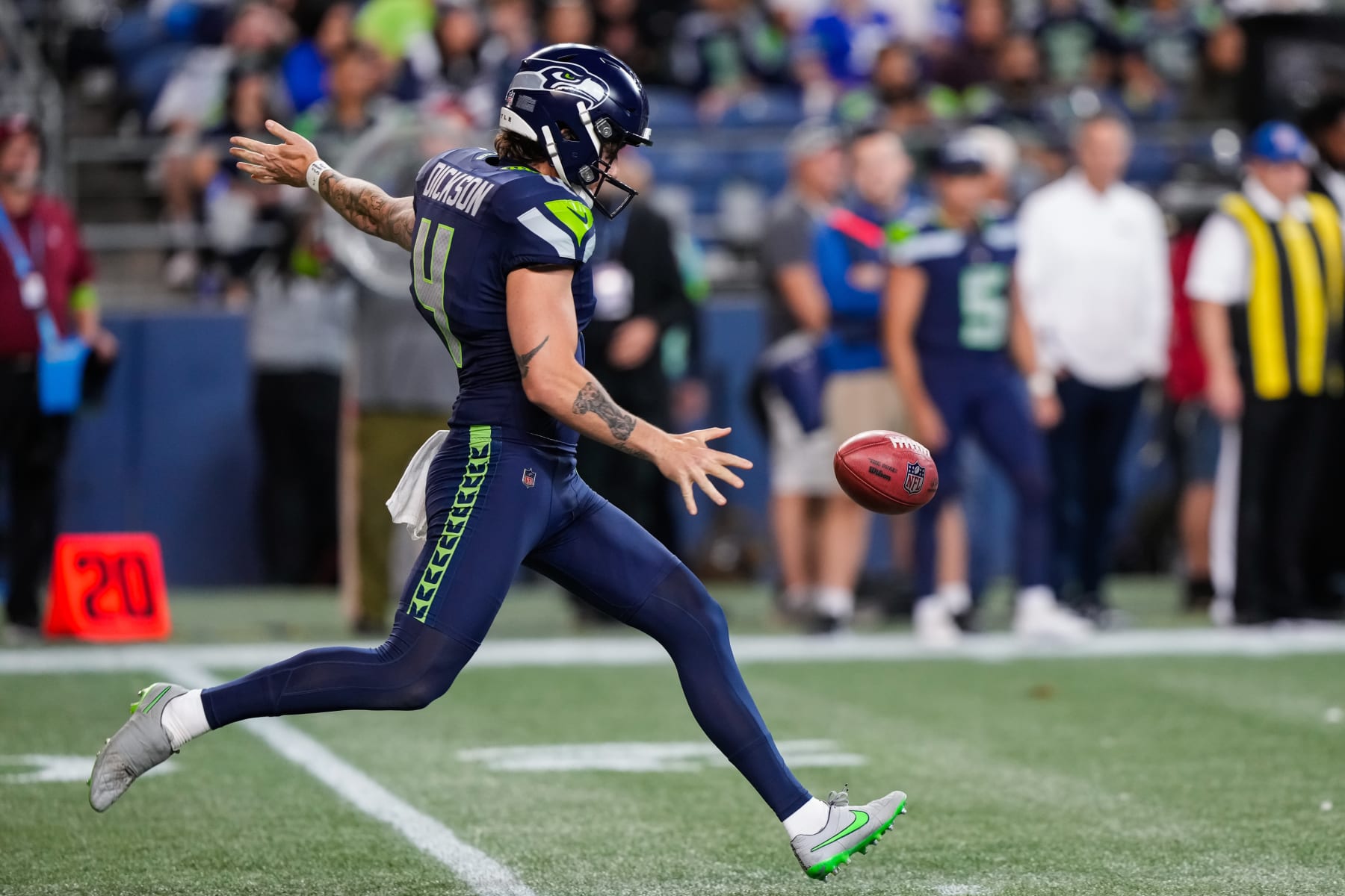 SEATTLE, WASHINGTON - AUGUST 10: Punter Michael Dickson #4 of the Seattle Seahawks punts the football during the second half of a preseason game against the Minnesota Vikings at Lumen Field on August 10, 2023 in Seattle, Washington. (Photo by Christopher Mast/Getty Images)