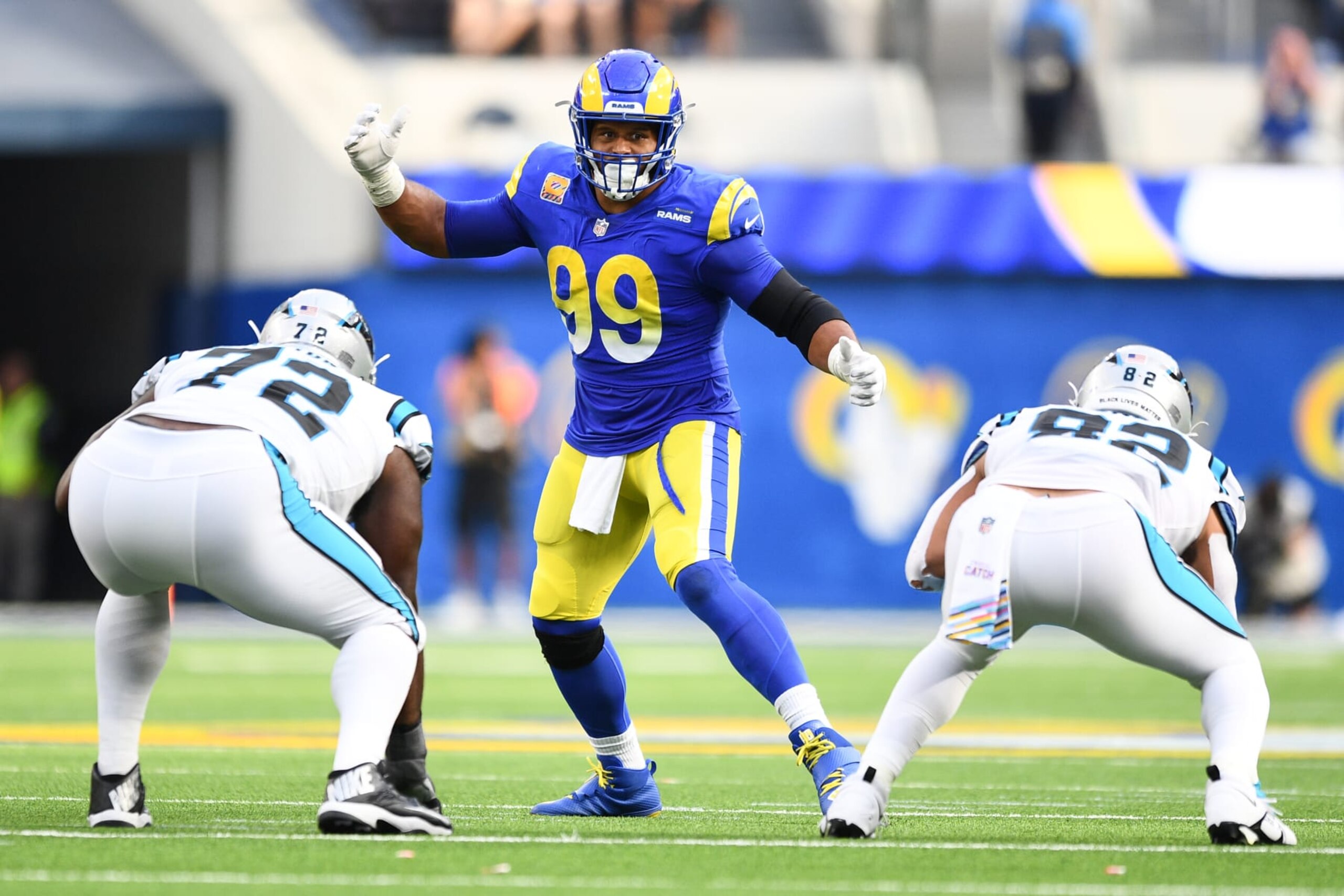 INGLEWOOD, CA - OCTOBER 16: Los Angeles Rams Defensive Tackle Aaron Donald (99) gets ready for the snap during the NFL game between the Carolina Panthers and the Los Angeles Rams on October 16, 2022, at SoFi Stadium in Inglewood, CA. (Photo by Brian Rothmuller/Icon Sportswire via Getty Images)