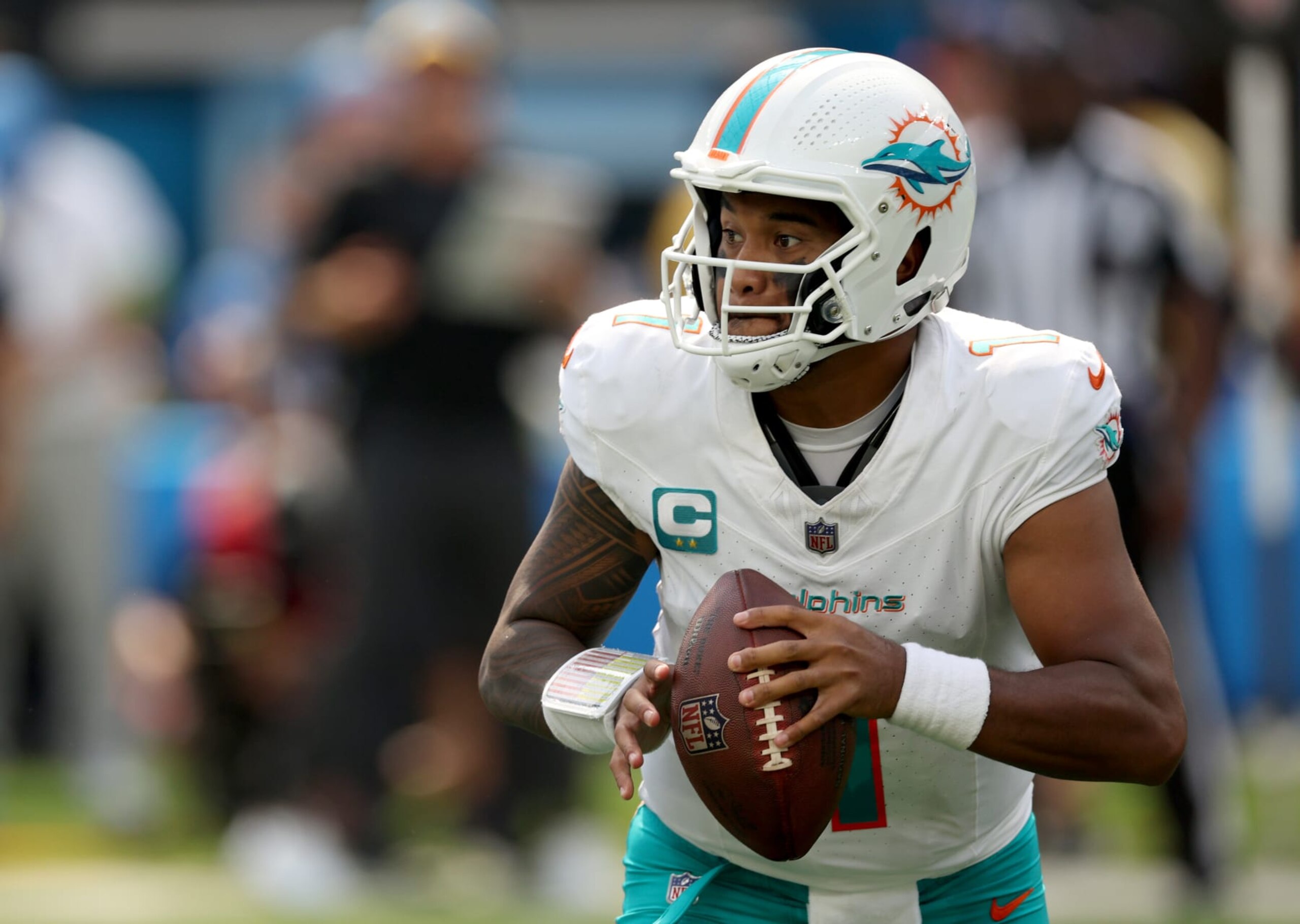INGLEWOOD, CALIFORNIA - SEPTEMBER 10: Tua Tagovailoa #1 of the Miami Dolphins drops back to pass during a 36-34 Dolphins win over the Los Angeles Chargers at SoFi Stadium on September 10, 2023 in Inglewood, California. (Photo by Harry How/Getty Images)
