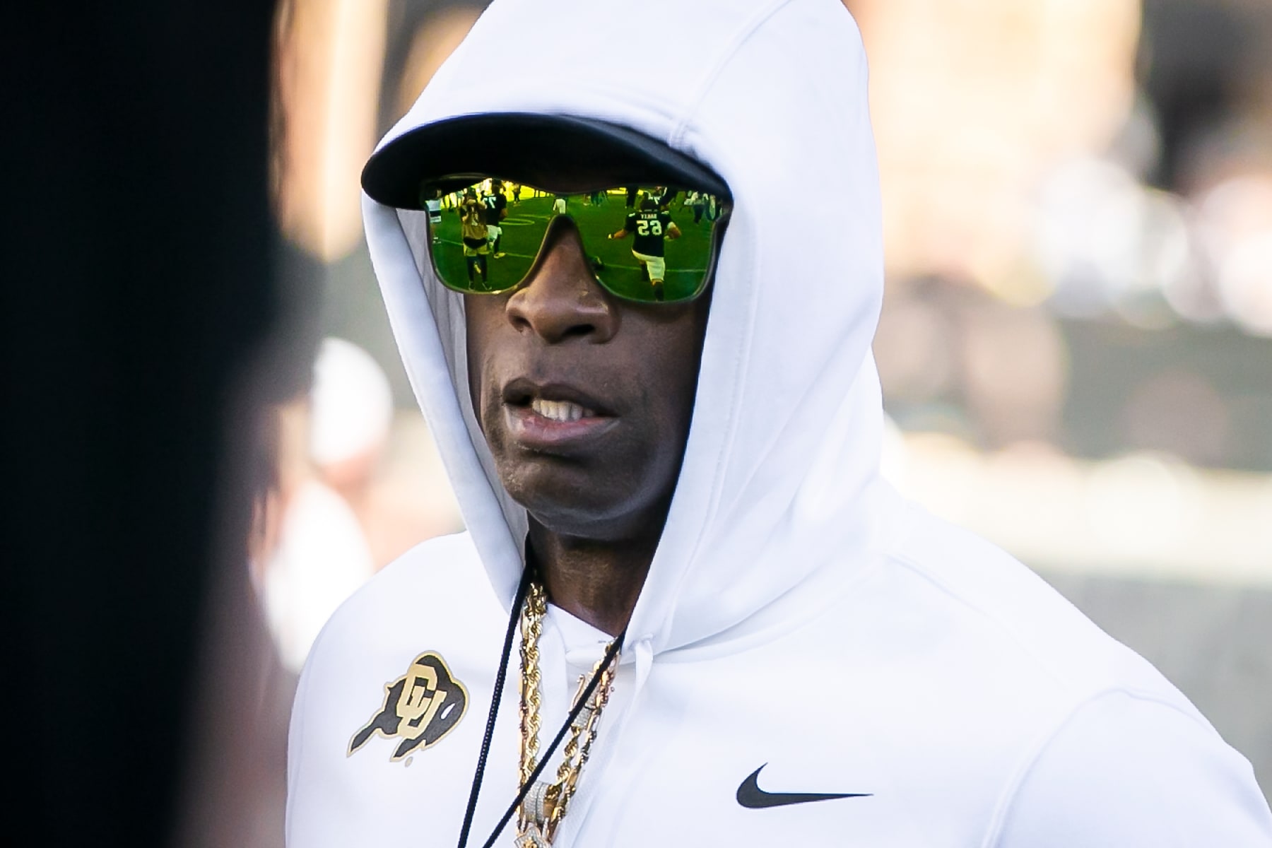 BOULDER, CO - SEPTEMBER 09: Colorado head coach Deion Sanders walks between his players during warmups prior to the home opener game between the Colorado Buffaloes and the the Nebraska Cornhuskers on Saturday, September 9, 2023 at Folsom Field in Boulder, CO.  (Photo by Nick Tre. Smith/Icon Sportswire via Getty Images)
