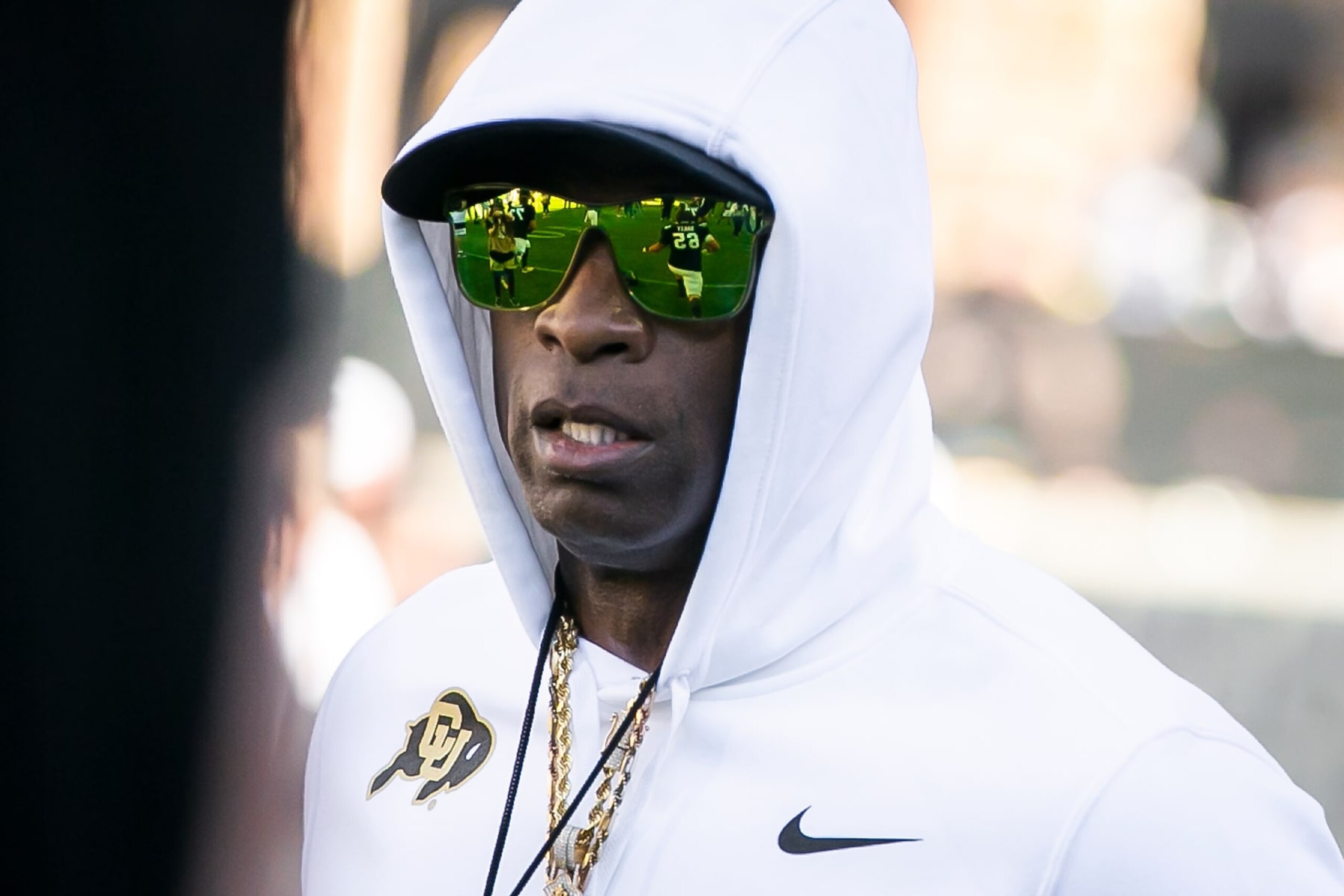 BOULDER, CO - SEPTEMBER 09: Colorado head coach Deion Sanders walks between his players during warmups prior to the home opener game between the Colorado Buffaloes and the the Nebraska Cornhuskers on Saturday, September 9, 2023 at Folsom Field in Boulder, CO. (Photo by Nick Tre. Smith/Icon Sportswire via Getty Images) BOULDER, CO - SEPTEMBER 09: Colorado head coach Deion Sanders walks between his players during warmups prior to the home opener game between the Colorado Buffaloes and the the Nebraska Cornhuskers on Saturday, September 9, 2023 at Folsom Field in Boulder, CO. (Photo by Nick Tre. Smith/Icon Sportswire via Getty Images)