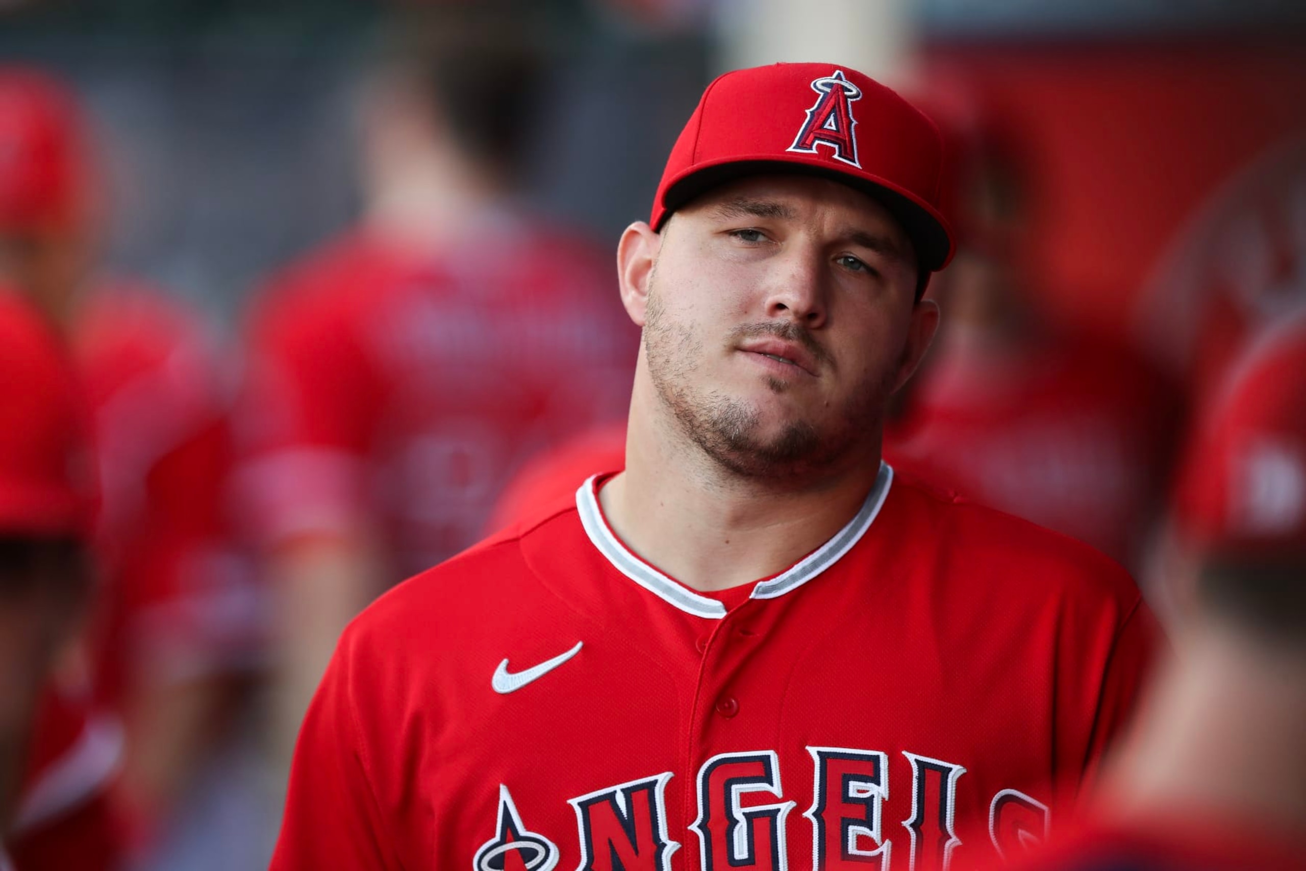 ANAHEIM, CALIFORNIA - AUGUST 22: Mike Trout #27 of the Los Angeles Angels looks on from the dugout ahead of the game against the Cincinnati Reds at Angel Stadium of Anaheim on August 22, 2023 in Anaheim, California. (Photo by Meg Oliphant/Getty Images)