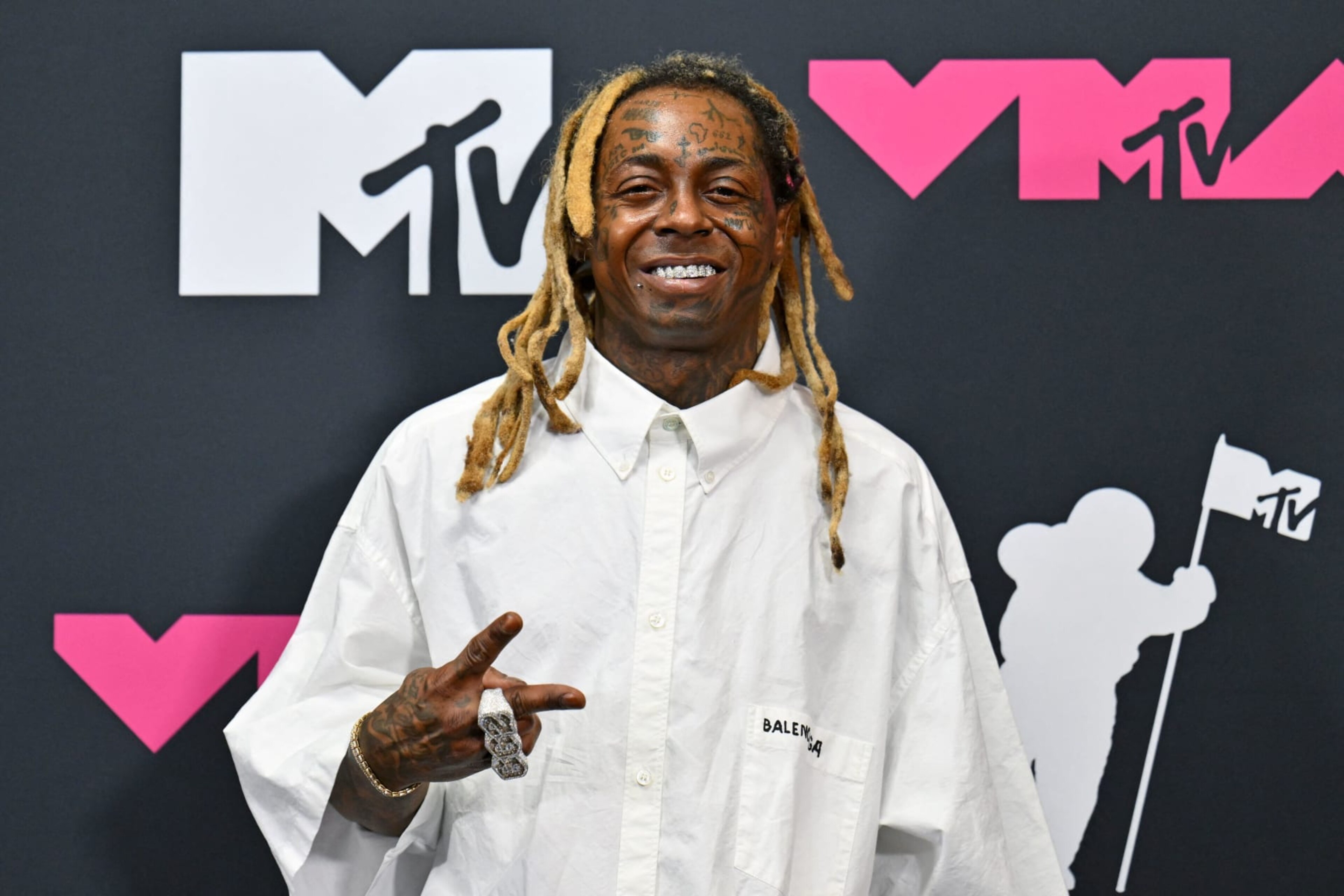 US rapper Lil Wayne poses in the press room during the MTV Video Music Awards at the Prudential Center in Newark, New Jersey, on September 12, 2023. (Photo by ANGELA WEISS / AFP) (Photo by ANGELA WEISS/AFP via Getty Images)