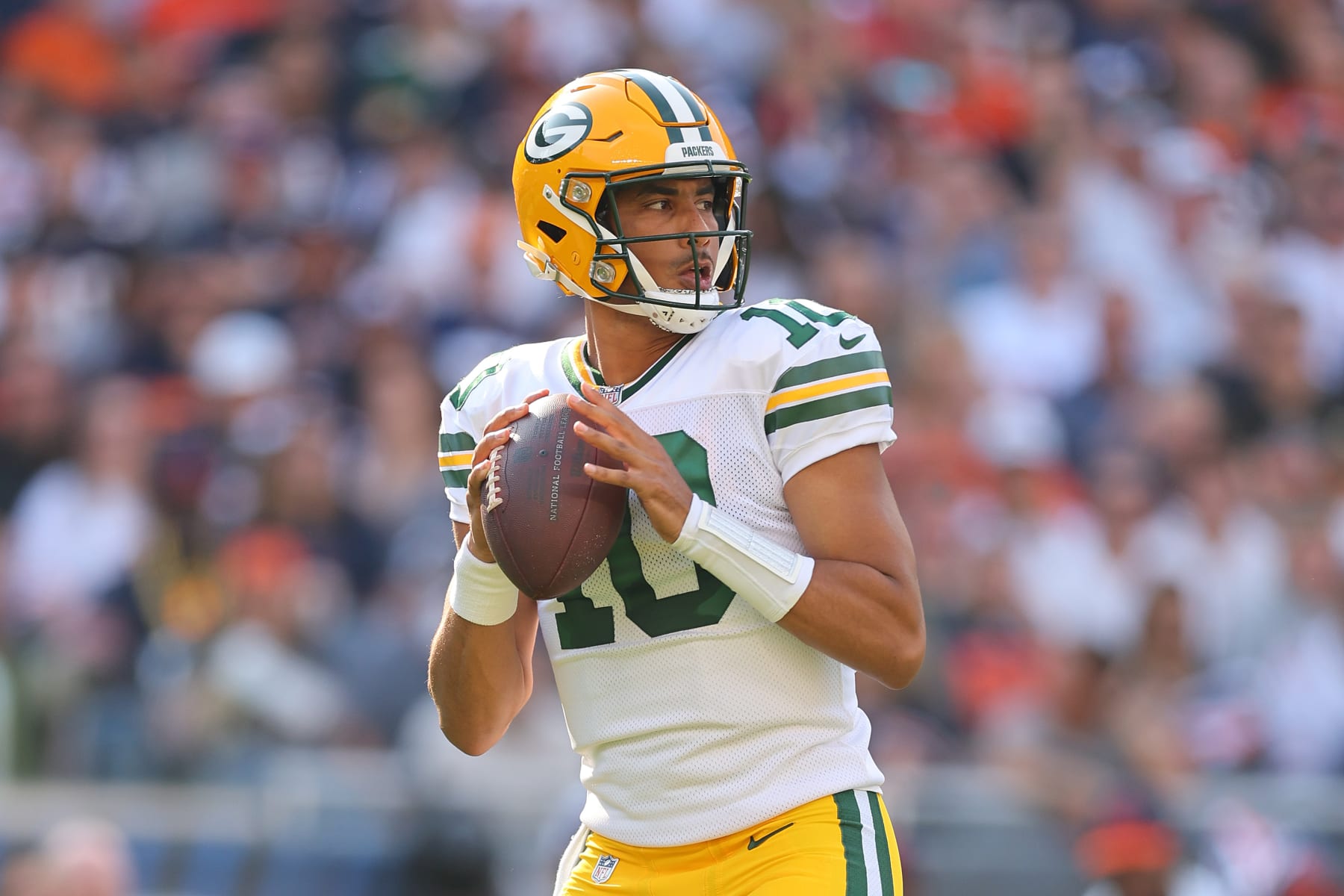 CHICAGO, ILLINOIS - SEPTEMBER 10: Jordan Love #10 of the Green Bay Packers looks to pass against the Chicago Bears during the second quarter at Soldier Field on September 10, 2023 in Chicago, Illinois. (Photo by Michael Reaves/Getty Images)