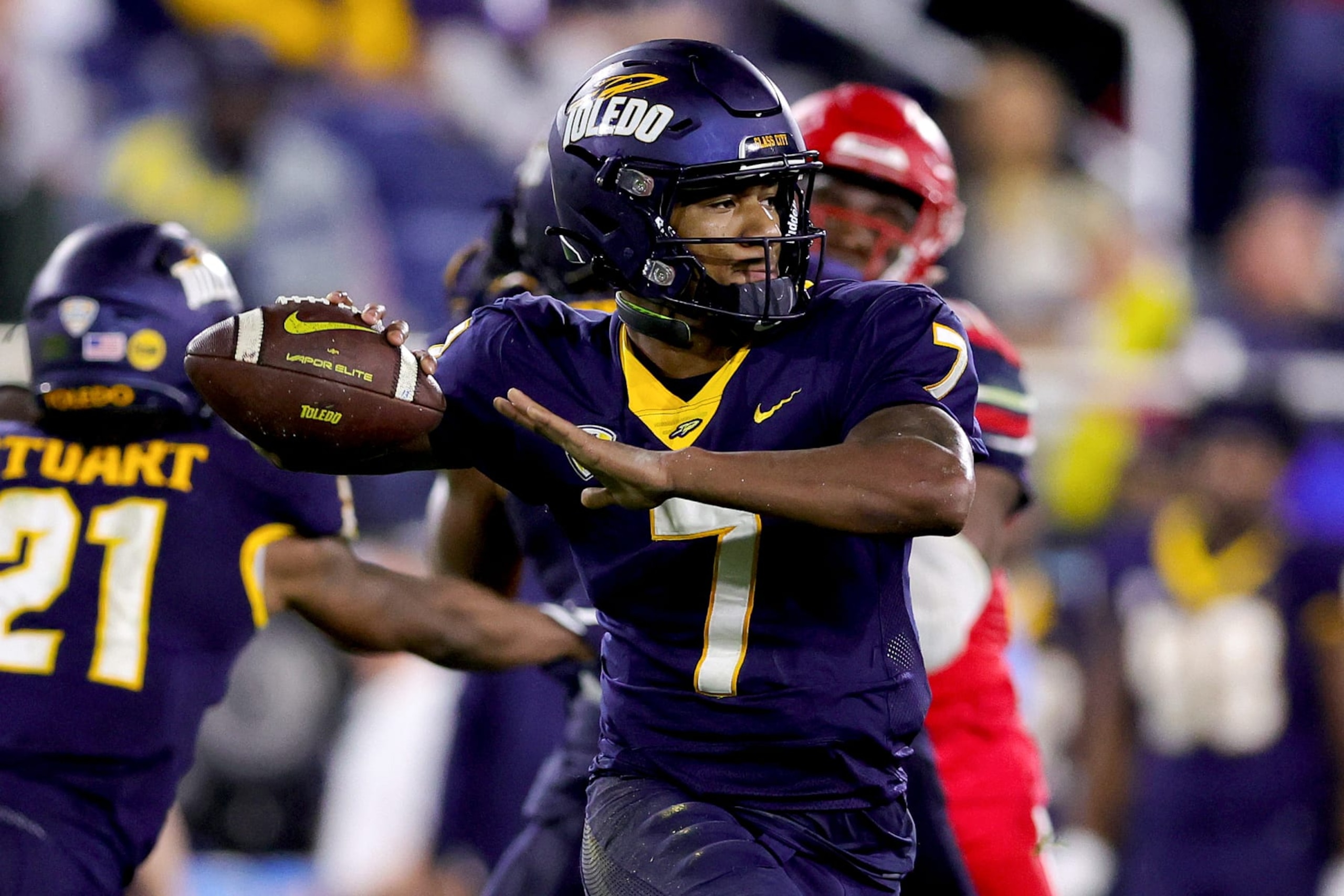BOCA RATON, FLORIDA - DECEMBER 20: Dequan Finn #7 of the Toledo Rockets throws a pass against the Liberty Flames during the first quarter of the RoofClaim.com Boca Raton Bowl game at FAU Stadium on December 20, 2022 in Boca Raton, Florida. (Photo by Megan Briggs/Getty Images) BOCA RATON, FLORIDA - DECEMBER 20: Dequan Finn #7 of the Toledo Rockets throws a pass against the Liberty Flames during the first quarter of the RoofClaim.com Boca Raton Bowl game at FAU Stadium on December 20, 2022 in Boca Raton, Florida. (Photo by Megan Briggs/Getty Images)