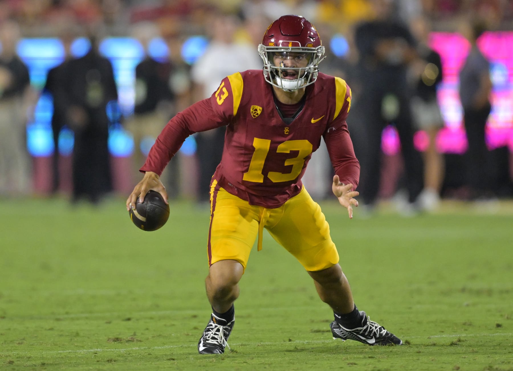 LOS ANGELES, CALIFORNIA - SEPTEMBER 9: Quarterback Caleb Williams #13 of the USC Trojans scrambles in the pocket in the game against the Stanford Cardinal at United Airlines Field at the Los Angeles Memorial Coliseum on September 9, 2023 in Los Angeles, California. (Photo by Jayne Kamin-Oncea/Getty Images)