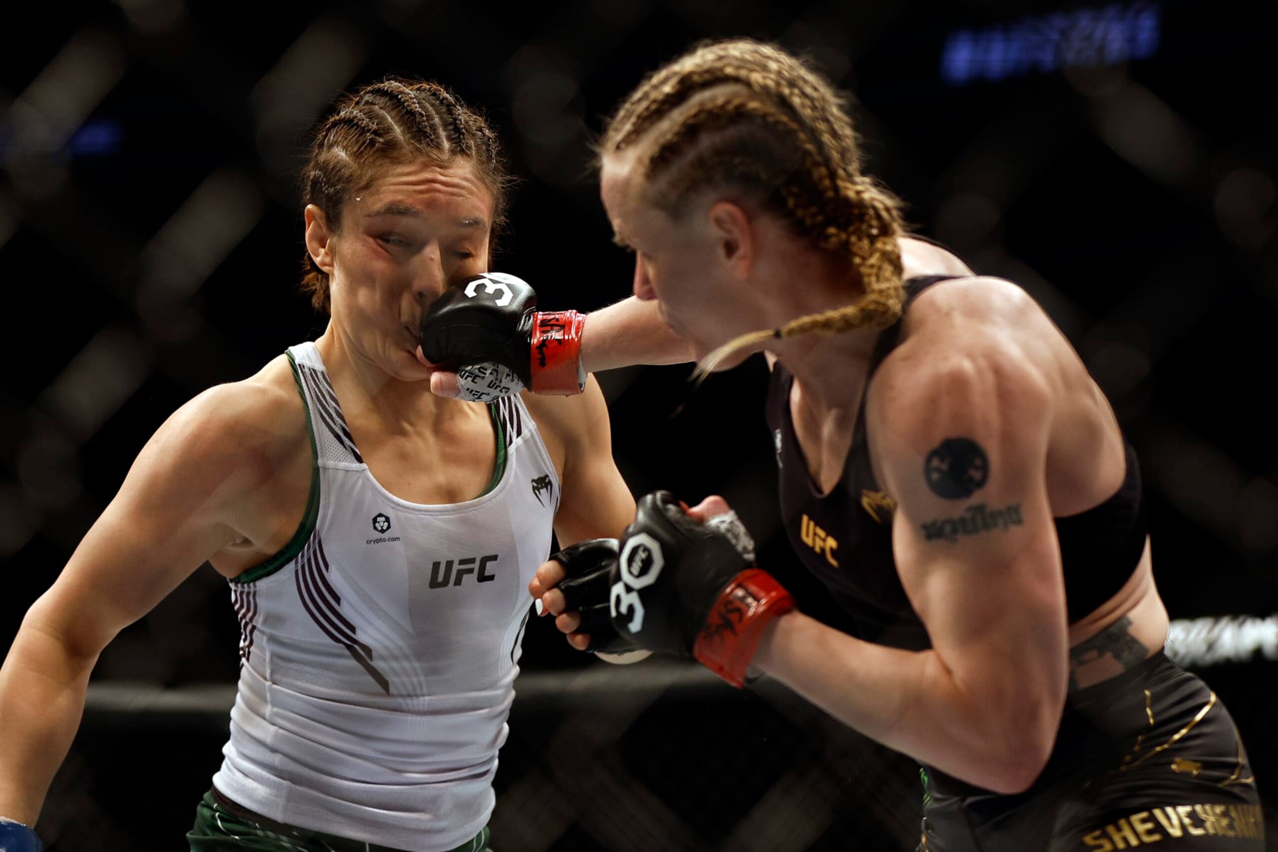 LAS VEGAS, NEVADA - MARCH 04: Alexa Grasso of Mexico fights Valentina Shevchenko of Kyrgyzstan in the UFC flyweight championship fight during the UFC 285 event at T-Mobile Arena on March 04, 2023 in Las Vegas, Nevada. (Photo by Chris Graythen/Getty Images)