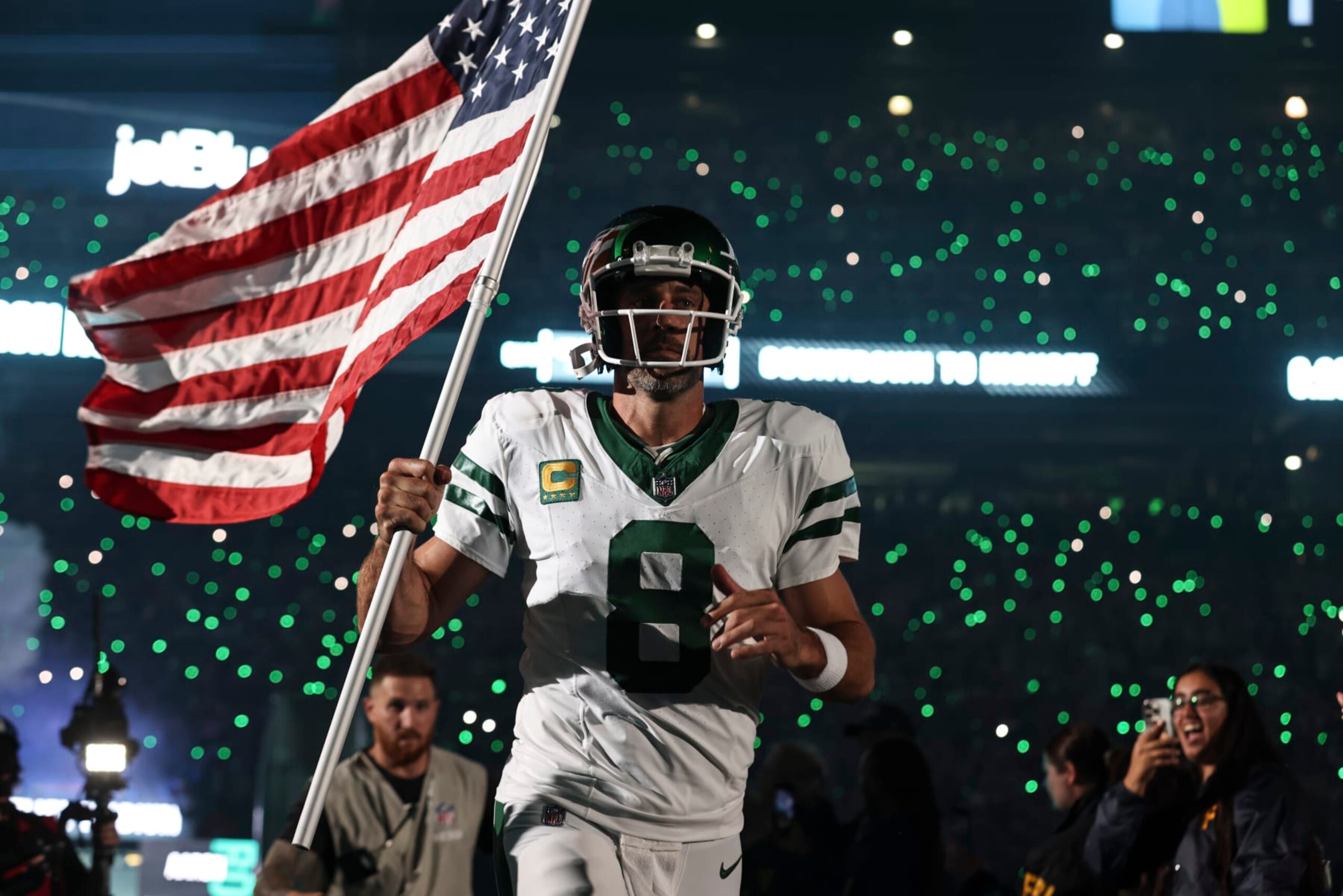 EAST RUTHERFORD, NEW JERSEY - SEPTEMBER 11: Aaron Rodgers #8 of the New York Jets takes the field prior to a game against the Buffalo Bills at MetLife Stadium on September 11, 2023 in East Rutherford, New Jersey. (Photo by Michael Owens/Getty Images) EAST RUTHERFORD, NEW JERSEY - SEPTEMBER 11: Aaron Rodgers #8 of the New York Jets takes the field prior to a game against the Buffalo Bills at MetLife Stadium on September 11, 2023 in East Rutherford, New Jersey. (Photo by Michael Owens/Getty Images)