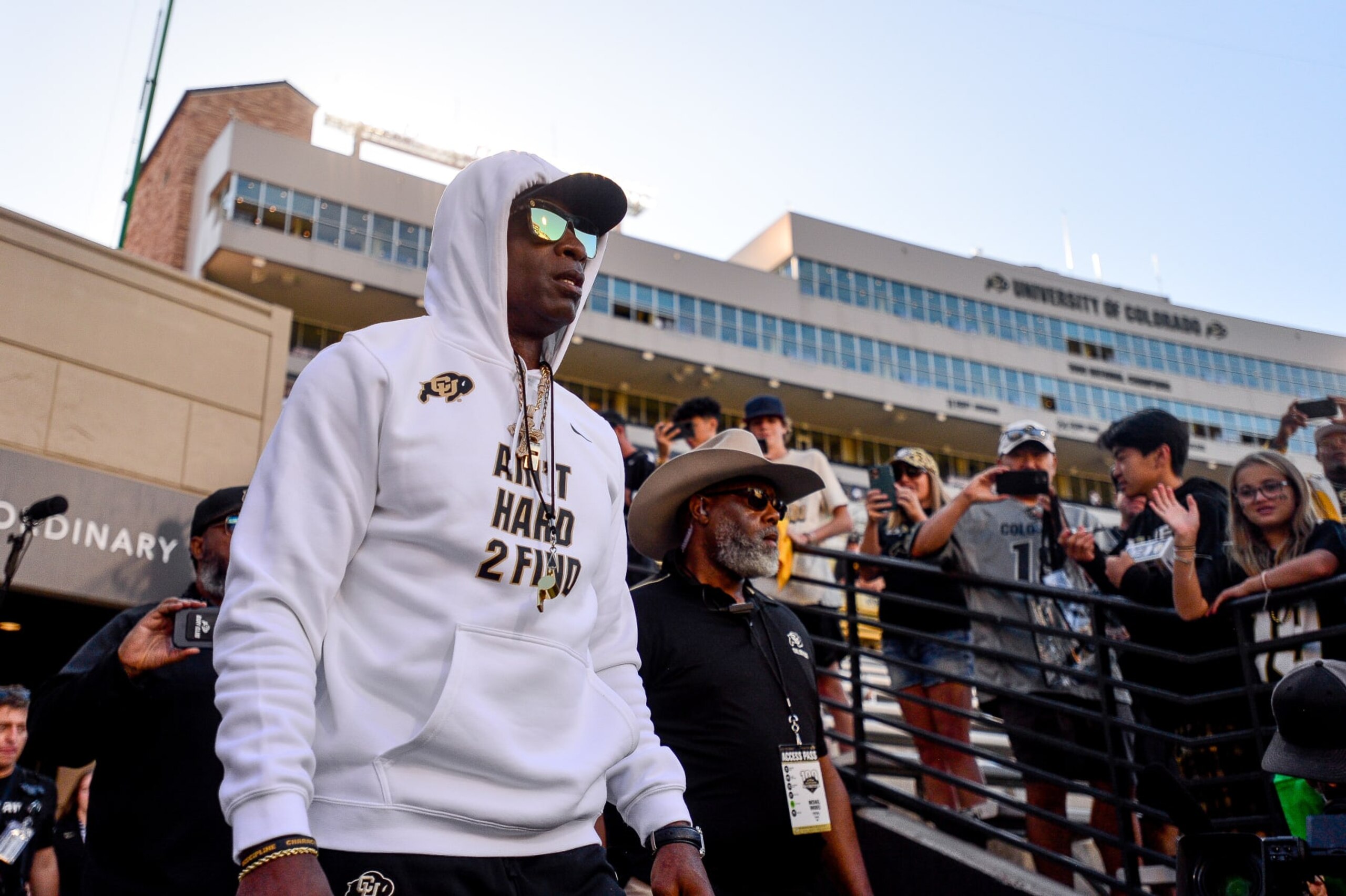 BOULDER, CO - SEPTEMBER 9:  Head coach Deion Sanders of the Colorado Buffaloes walks onto the field before a game against the Nebraska Cornhuskers at Folsom Field on September 9, 2023 in Boulder, Colorado. (Photo by Dustin Bradford/Getty Images)