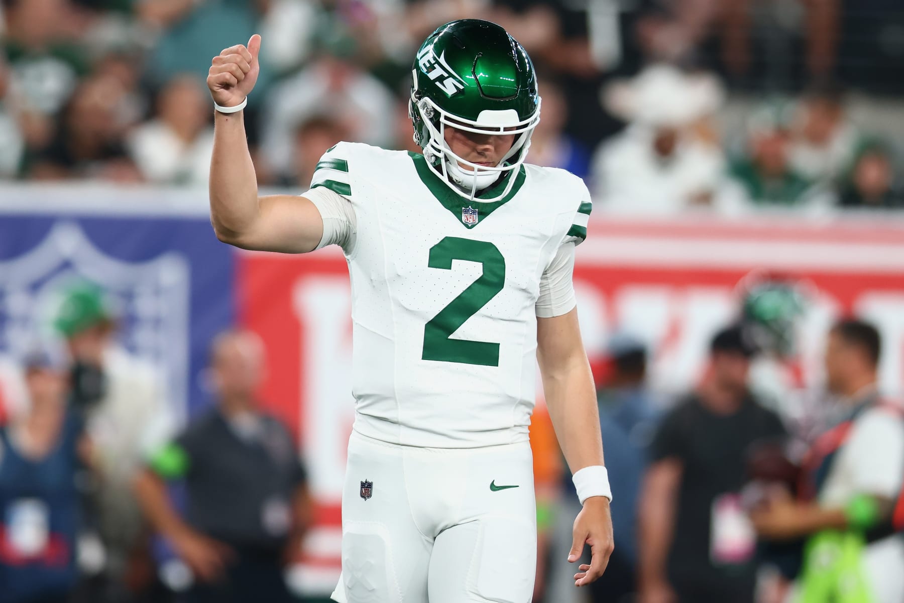 EAST RUTHERFORD, NEW JERSEY - SEPTEMBER 11: Quarterback Zach Wilson #2 of the New York Jets reacts as he checks in to the first quarter of the NFL game against the Buffalo Bills at MetLife Stadium on September 11, 2023 in East Rutherford, New Jersey. (Photo by Mike Stobe/Getty Images)