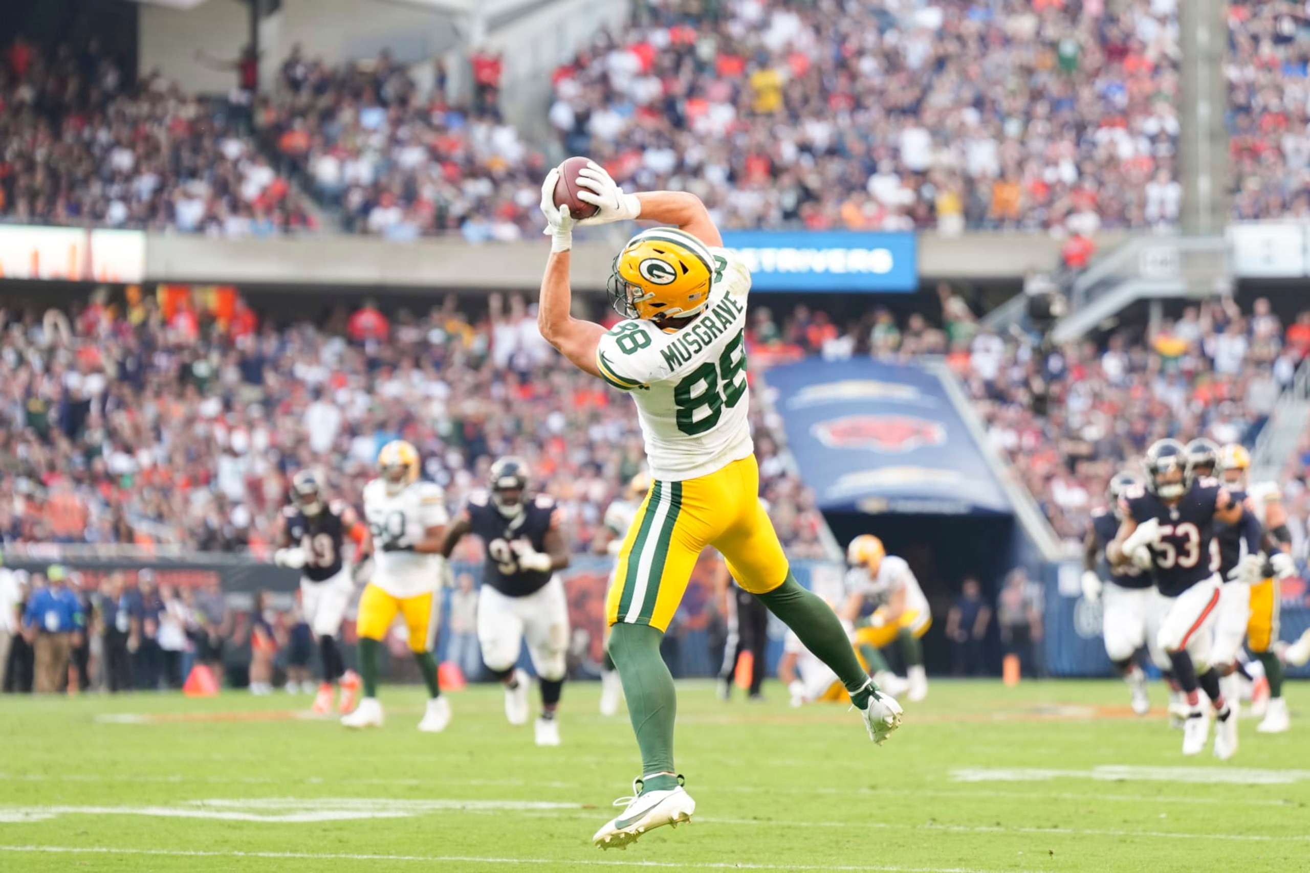 CHICAGO, IL - SEPTEMBER 10:  Tight end Luke Musgrave #88 of the Green Bay Packers attempts a catch during an NFL football game against the Chicago Bears at Soldier Field on September 10, 2023 in Chicago, Illinois. (Photo by Todd Rosenberg/Getty Images)