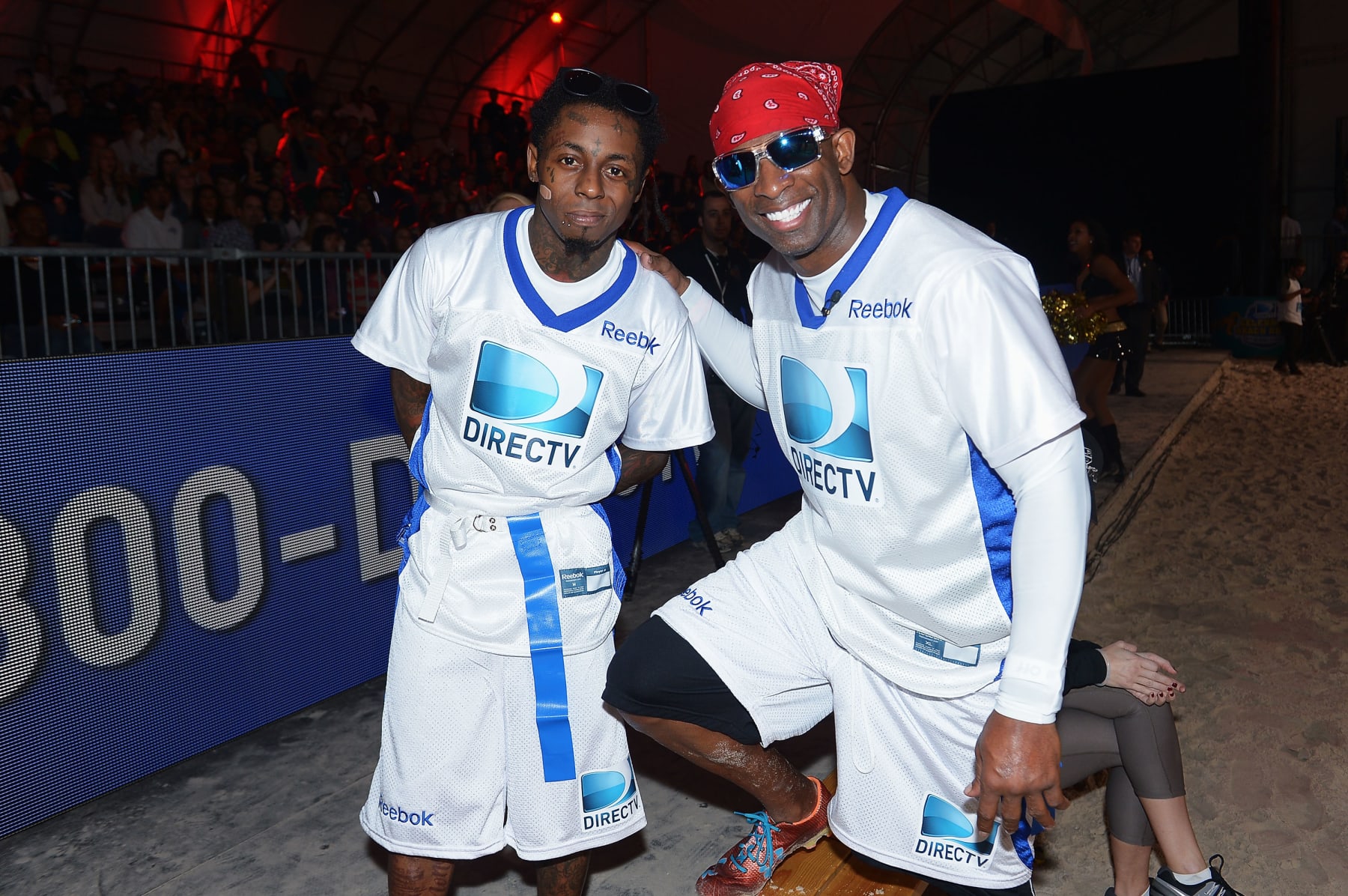 NEW ORLEANS, LA - FEBRUARY 02:  Rapper Lil Wayne (L) and Deion Sanders attend DIRECTV'S Seventh Annual Celebrity Beach Bowl at DTV SuperFan Stadium at Mardi Gras World on February 2, 2013 in New Orleans, Louisiana.  (Photo by Michael Loccisano/Getty Images For DirecTV)