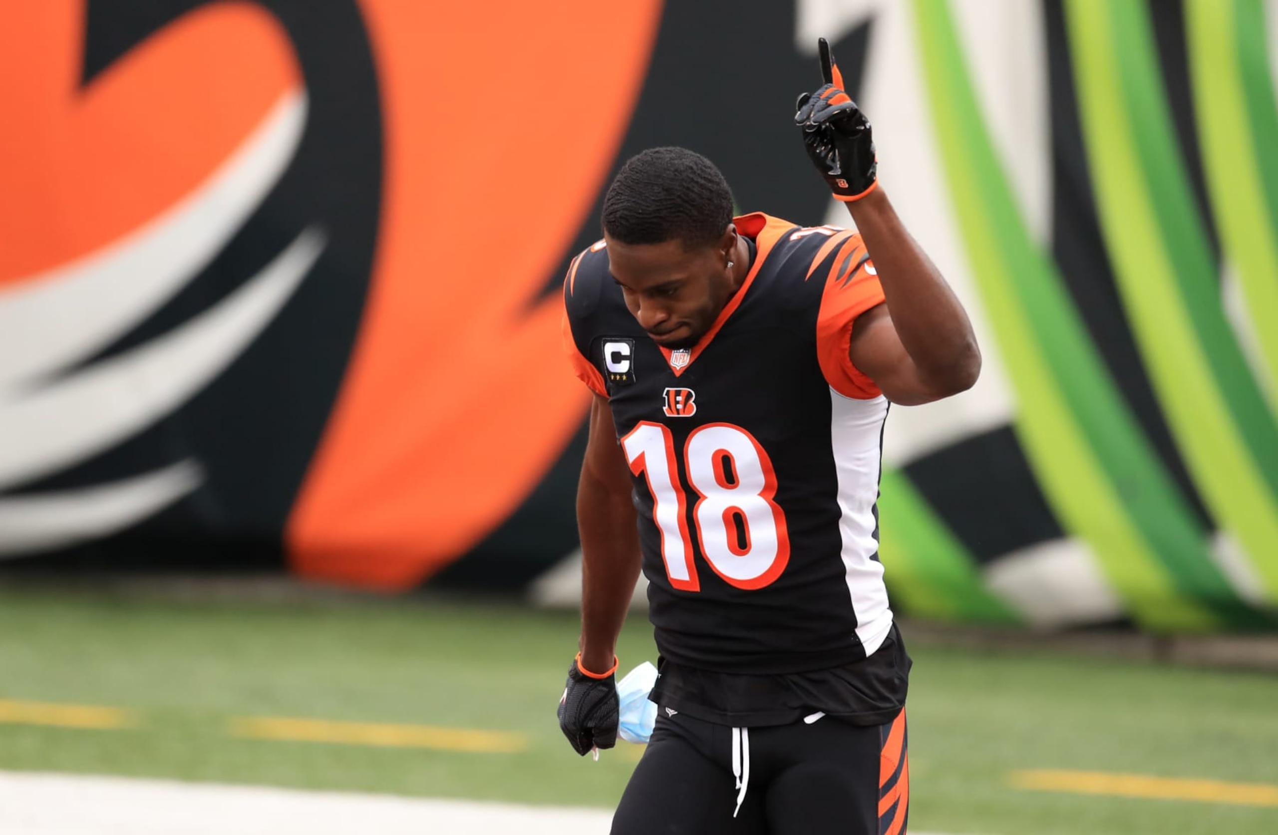 CINCINNATI, OH - JANUARY 03: Cincinnati Bengals wide receiver A.J. Green (18) runs onto the field before the game against the Baltimore Ravens and the Cincinnati Bengals on January 3, 2021, at Paul Brown Stadium in Cincinnati, OH. (Photo by Ian Johnson/Icon Sportswire via Getty Images)