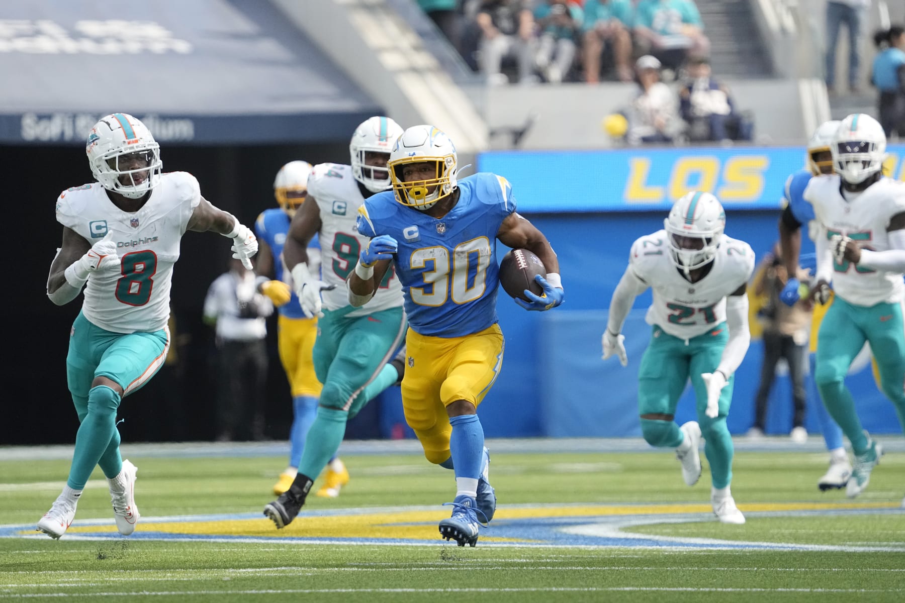 Los Angeles Chargers running back Austin Ekeler (30) runs against the Miami Dolphins during the first half of an NFL football game Sunday, Sept. 10, 2023, in Inglewood, Calif. (AP Photo/Mark J. Terrill)