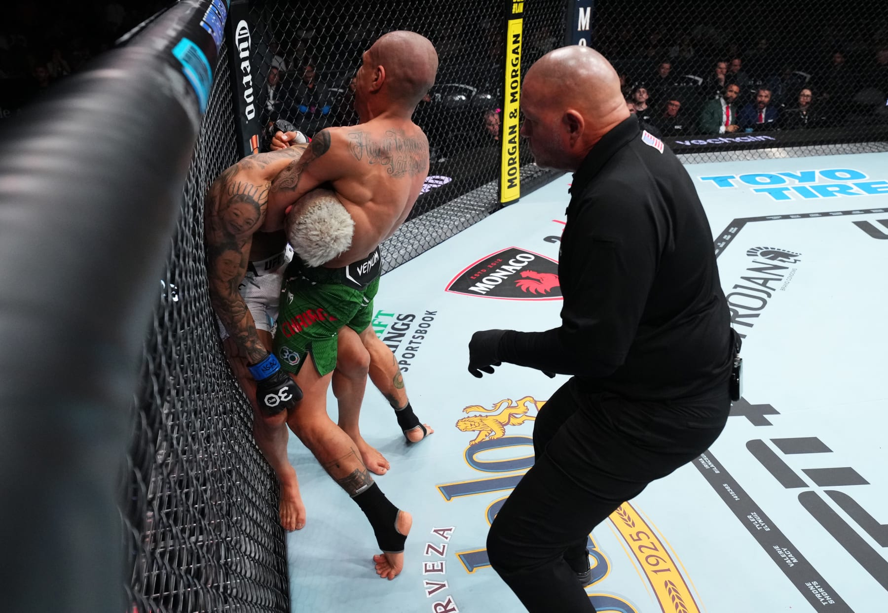 LAS VEGAS, NEVADA - SEPTEMBER 16: (R-L) Edgar Chairez of Mexico works for a guillotine choke against Daniel Lacerda of Brazil in a flyweight fight during the Noche UFC event at T-Mobile Arena on September 16, 2023 in Las Vegas, Nevada. (Photo by Chris Unger/Zuffa LLC via Getty Images)
