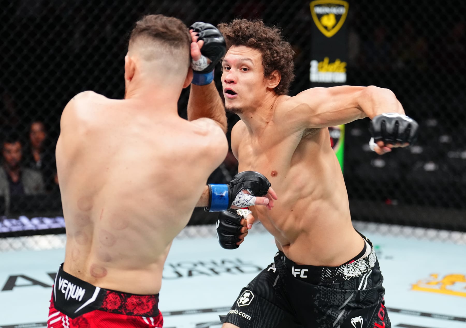 LAS VEGAS, NEVADA - SEPTEMBER 16: (R-L) Roman Kopylov of Russia punches \j in a middleweight fight during the Noche UFC event at T-Mobile Arena on September 16, 2023 in Las Vegas, Nevada. (Photo by Chris Unger/Zuffa LLC via Getty Images)