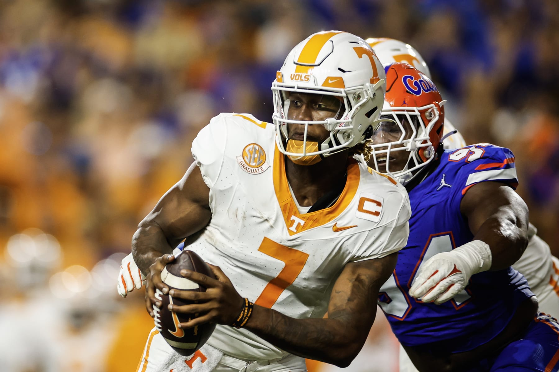 GAINESVILLE, FLORIDA - SEPTEMBER 16: Joe Milton III #7 of the Tennessee Volunteers is sacked by Tyreak Sapp #94 of the Florida Gators during the first half of a game at Ben Hill Griffin Stadium on September 16, 2023 in Gainesville, Florida. (Photo by James Gilbert/Getty Images) GAINESVILLE, FLORIDA - SEPTEMBER 16: Joe Milton III #7 of the Tennessee Volunteers is sacked by Tyreak Sapp #94 of the Florida Gators during the first half of a game at Ben Hill Griffin Stadium on September 16, 2023 in Gainesville, Florida. (Photo by James Gilbert/Getty Images)