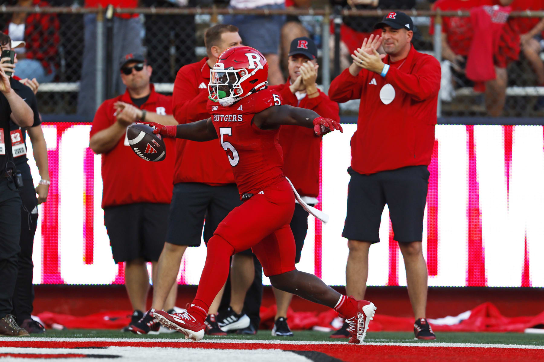 PISCATAWAY, NEW JERSEY - SEPTEMBER 16:  Running back Kyle Monangai #5 of the Rutgers Scarlet Knights celebrates his touchdown against the Virginia Tech Hokies during the fourth quarter of a college football game at SHI Stadium on September 16, 2023 in Piscataway, New Jersey. Rutgers defeated Virginia Tech 35-16. (Photo by Rich Schultz/Getty Images)