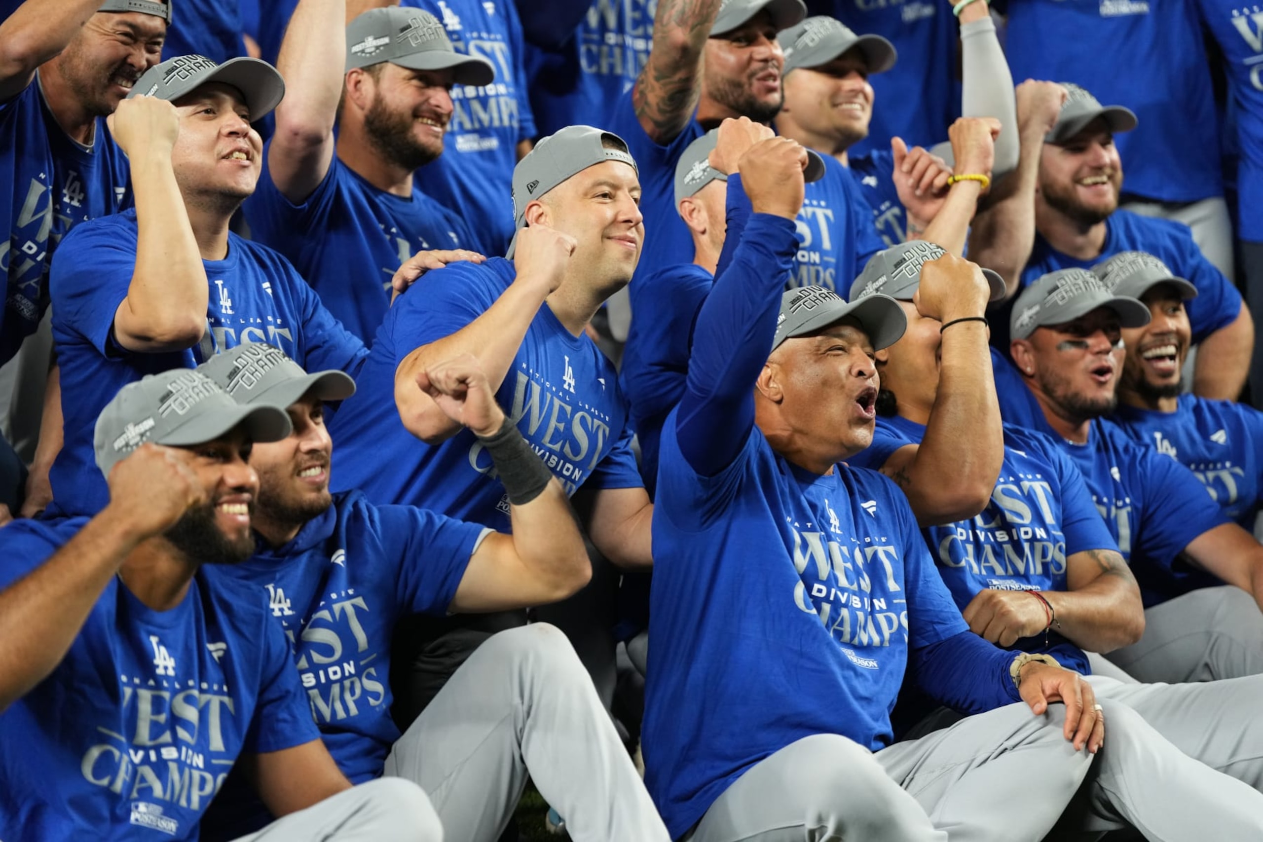 SEATTLE, WA - SEPTEMBER 16:   Members of the Los Angeles Dodgers celebrate after clinching the National League West after the game between the Los Angeles Dodgers and the Seattle Mariners at T-Mobile Park on Saturday, September 16, 2023 in Seattle, Washington. (Photo by Liv Lyons/MLB Photos via Getty Images)