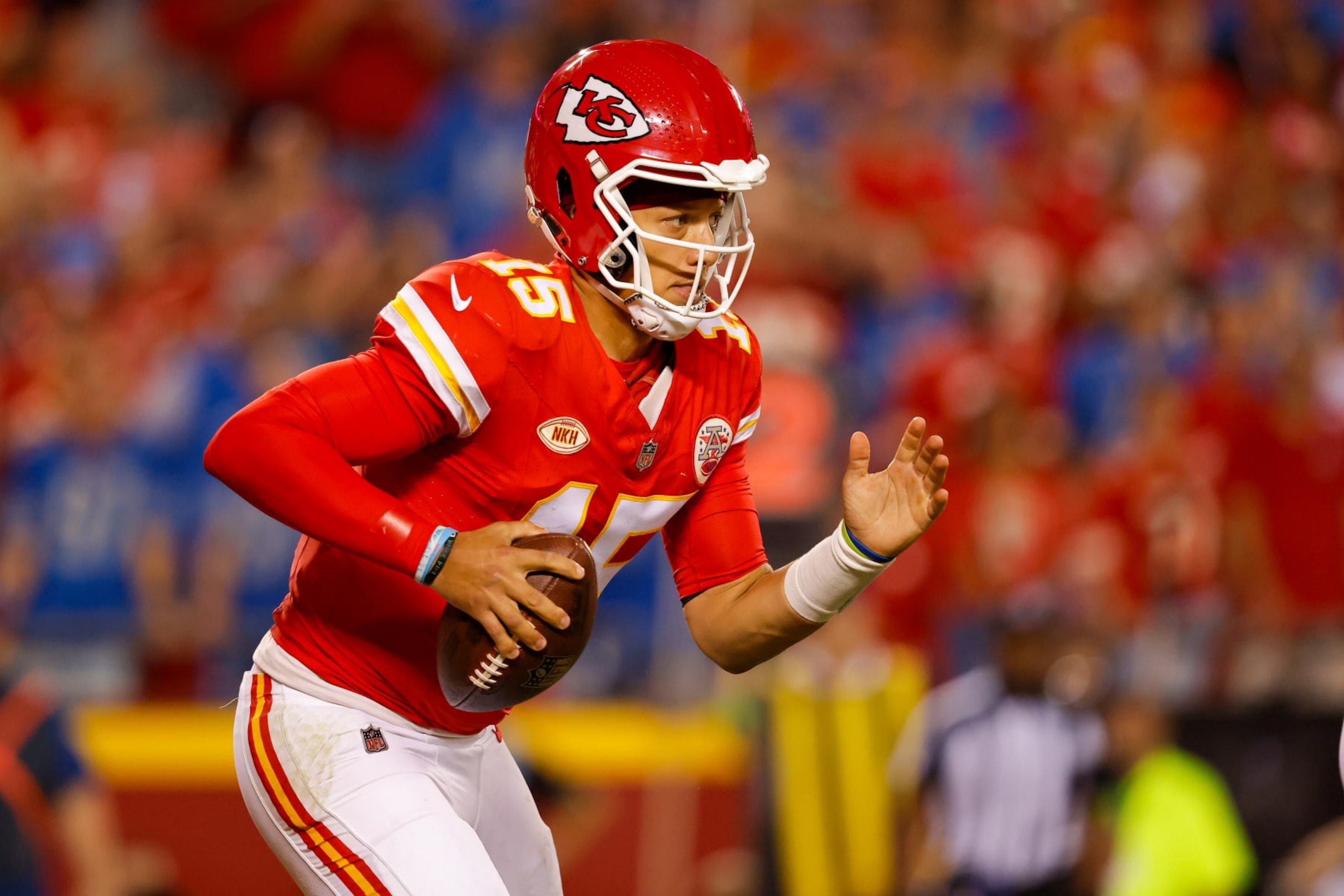 KANSAS CITY, MISSOURI - SEPTEMBER 7: Patrick Mahomes #15 of the Kansas City Chiefs scrambles for yardage during the third quarter agains the Detroit Lions at GEHA Field at Arrowhead Stadium on September 7, 2023 in Kansas City, Missouri. (Photo by David Eulitt/Getty Images)