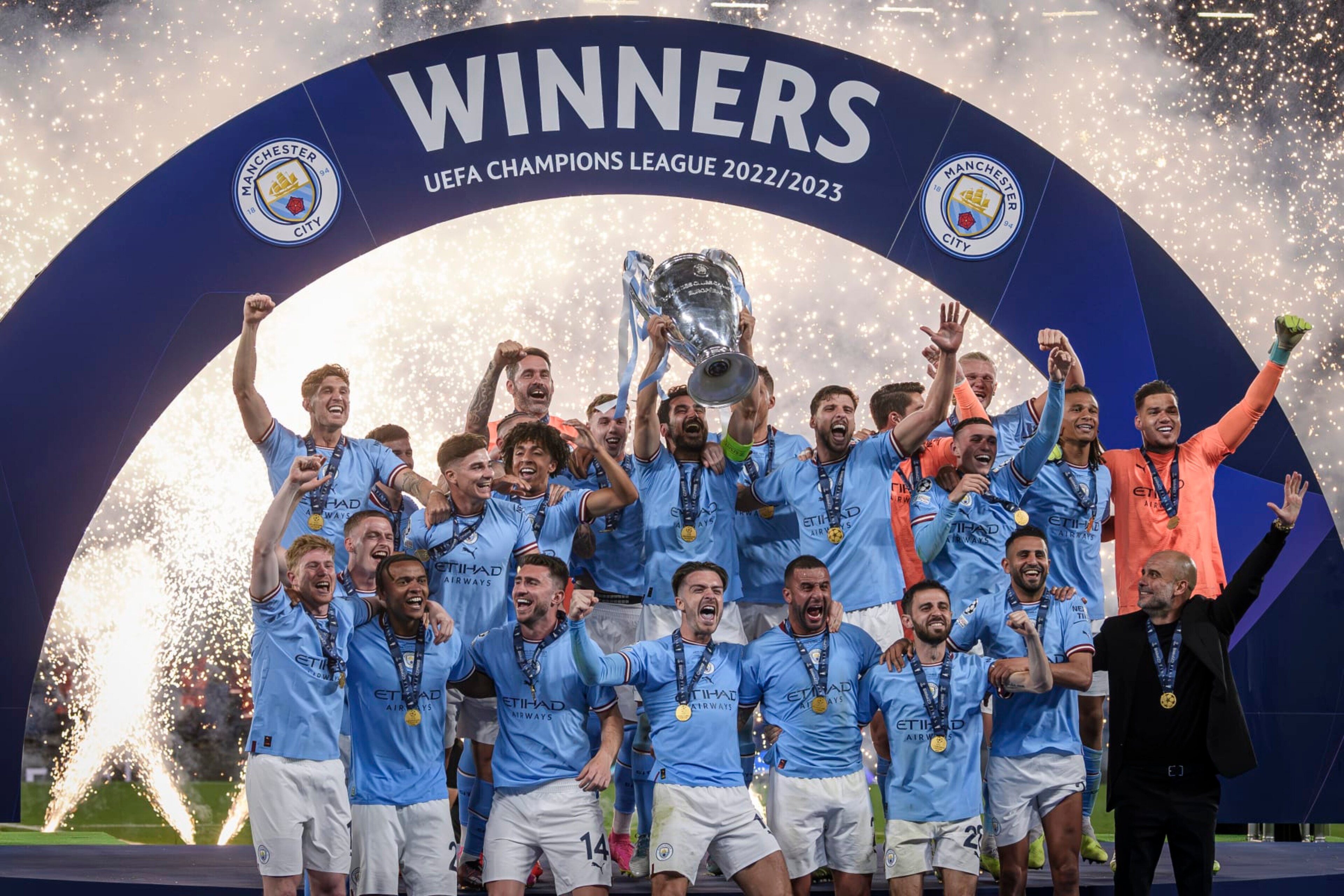ATATURK OLYMPIC STADIUM, ISTANBUL, TURKEY - 2023/06/11: Ilkay Gundogan (C) of Manchester City FC lifts the trophy as the teammates celebrate during the award ceremony following the UEFA Champions League final football match between Manchester City FC and FC Internazionale. Manchester City FC won 1-0 over FC Internazionale. (Photo by Nicolò Campo/LightRocket via Getty Images)