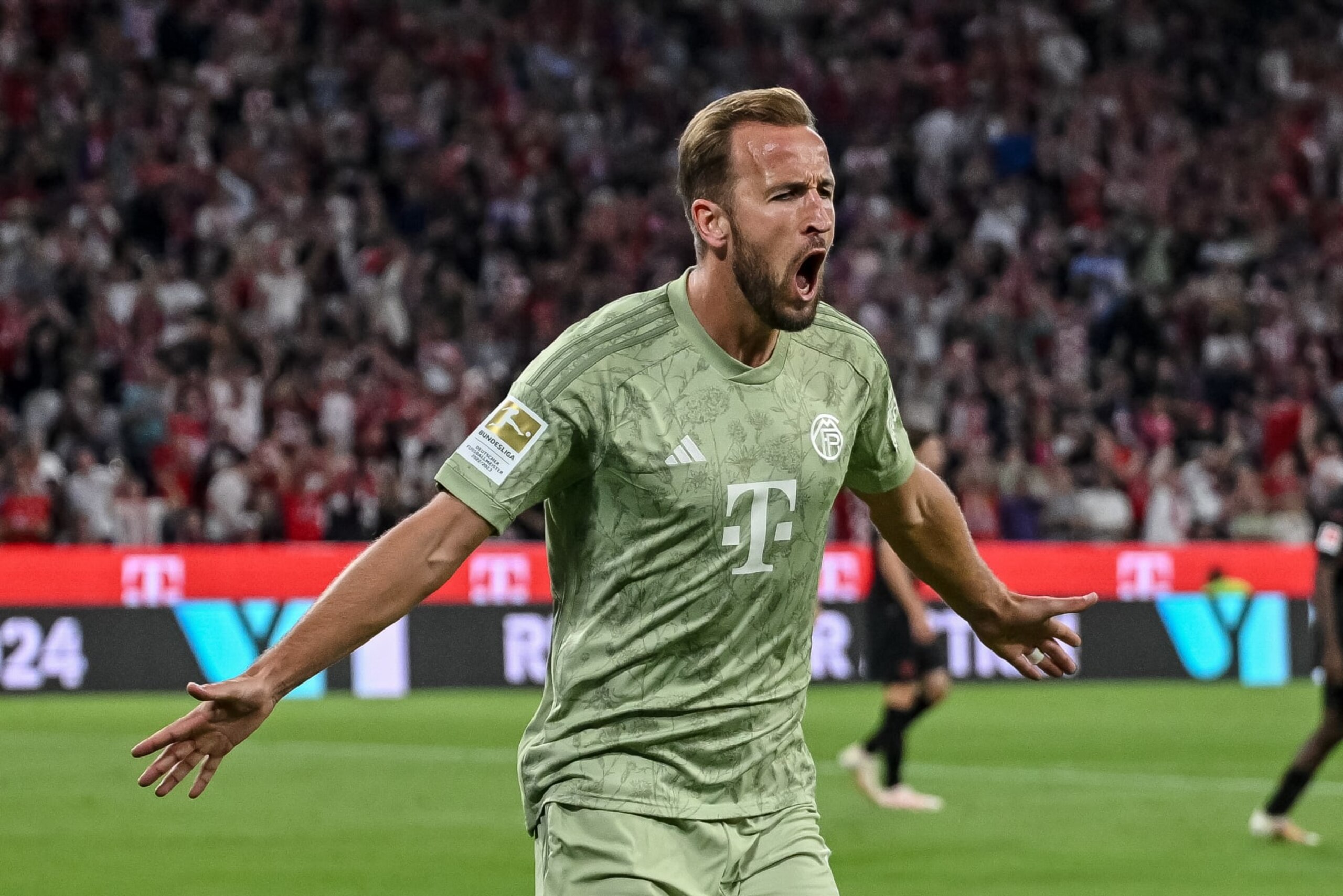 MUNICH, GERMANY - SEPTEMBER 15: Harry Kane of Bayern Muenchen celebrates after scoring his team's first goal during the Bundesliga match between FC Bayern München and Bayer 04 Leverkusen at Allianz Arena on September 15, 2023 in Munich, Germany. (Photo by Harry Langer/DeFodi Images via Getty Images)