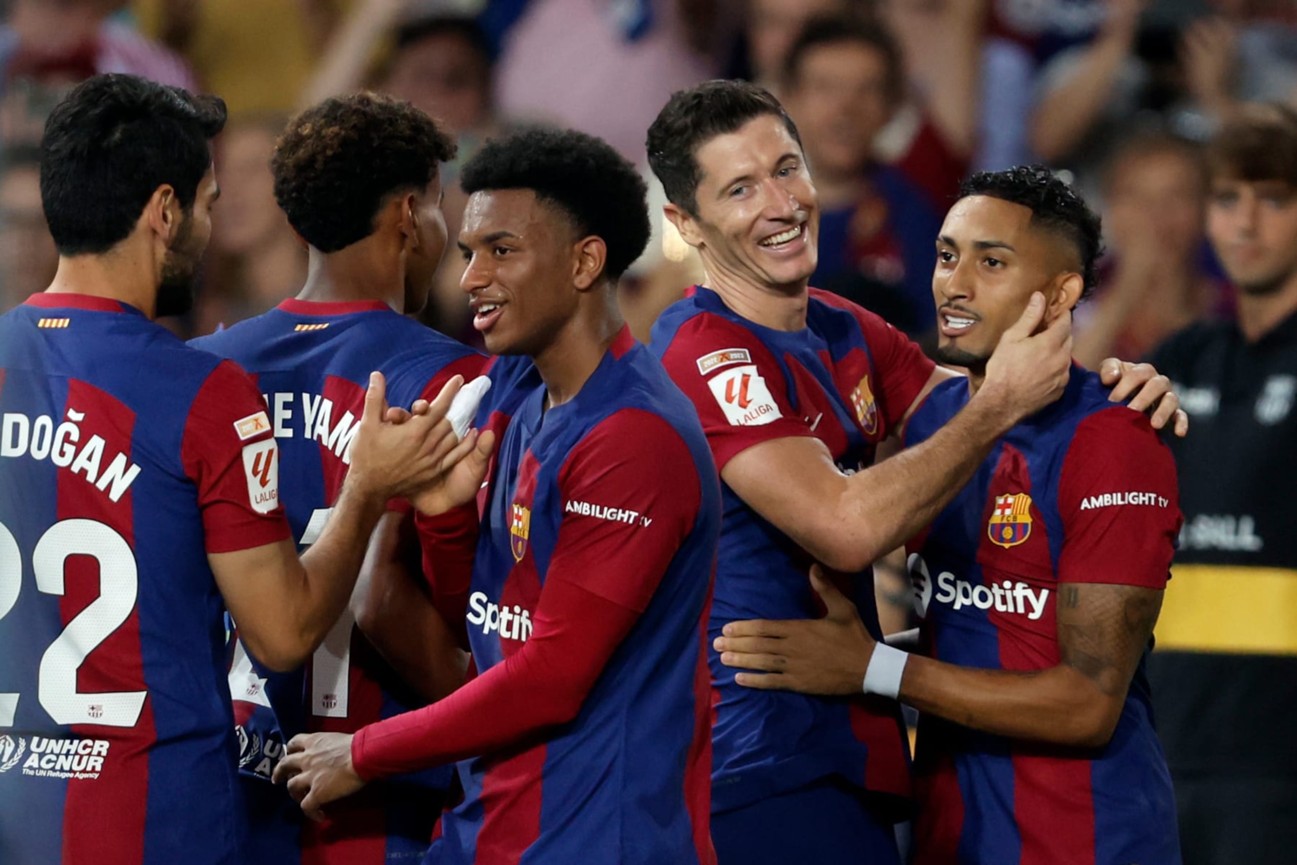 BARCELONA, SPAIN - SEPTEMBER 16: Raphinha of FC Barcelona celebrates 4-0 with Ilkay Gundogan of FC Barcelona, Lamine Yamal of FC Barcelona, Alejandro Balde of FC Barcelona, Robert Lewandowski of FC Barcelona  during the LaLiga EA Sports  match between FC Barcelona v Real Betis Sevilla at the Lluis Companys Olympic Stadium on September 16, 2023 in Barcelona Spain (Photo by Eric Verhoeven/Soccrates/Getty Images)