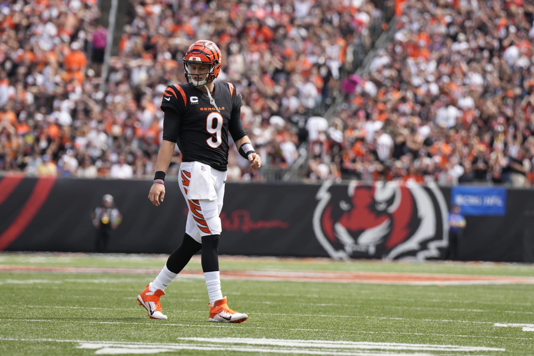 Cincinnati Bengals quarterback Joe Burrow walks on the field during the first half of an NFL football game against the Baltimore Ravens Sunday, Sept. 17, 2023, in Cincinnati. (AP Photo/Jeff Dean)