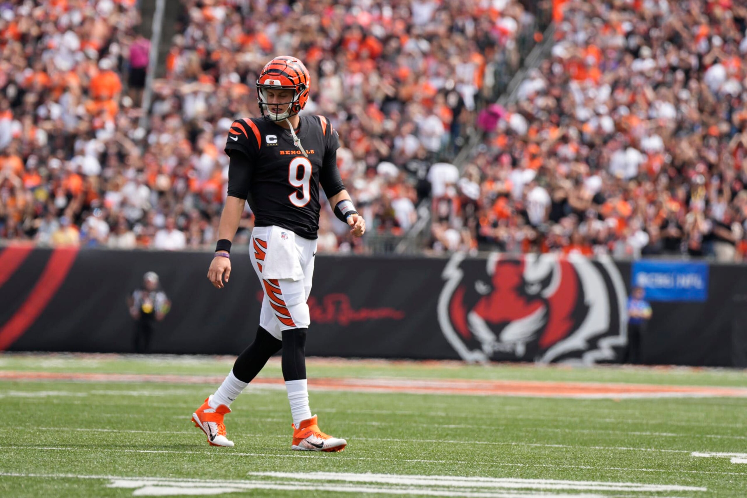 Cincinnati Bengals quarterback Joe Burrow walks on the field during the first half of an NFL football game against the Baltimore Ravens Sunday, Sept. 17, 2023, in Cincinnati. (AP Photo/Jeff Dean)