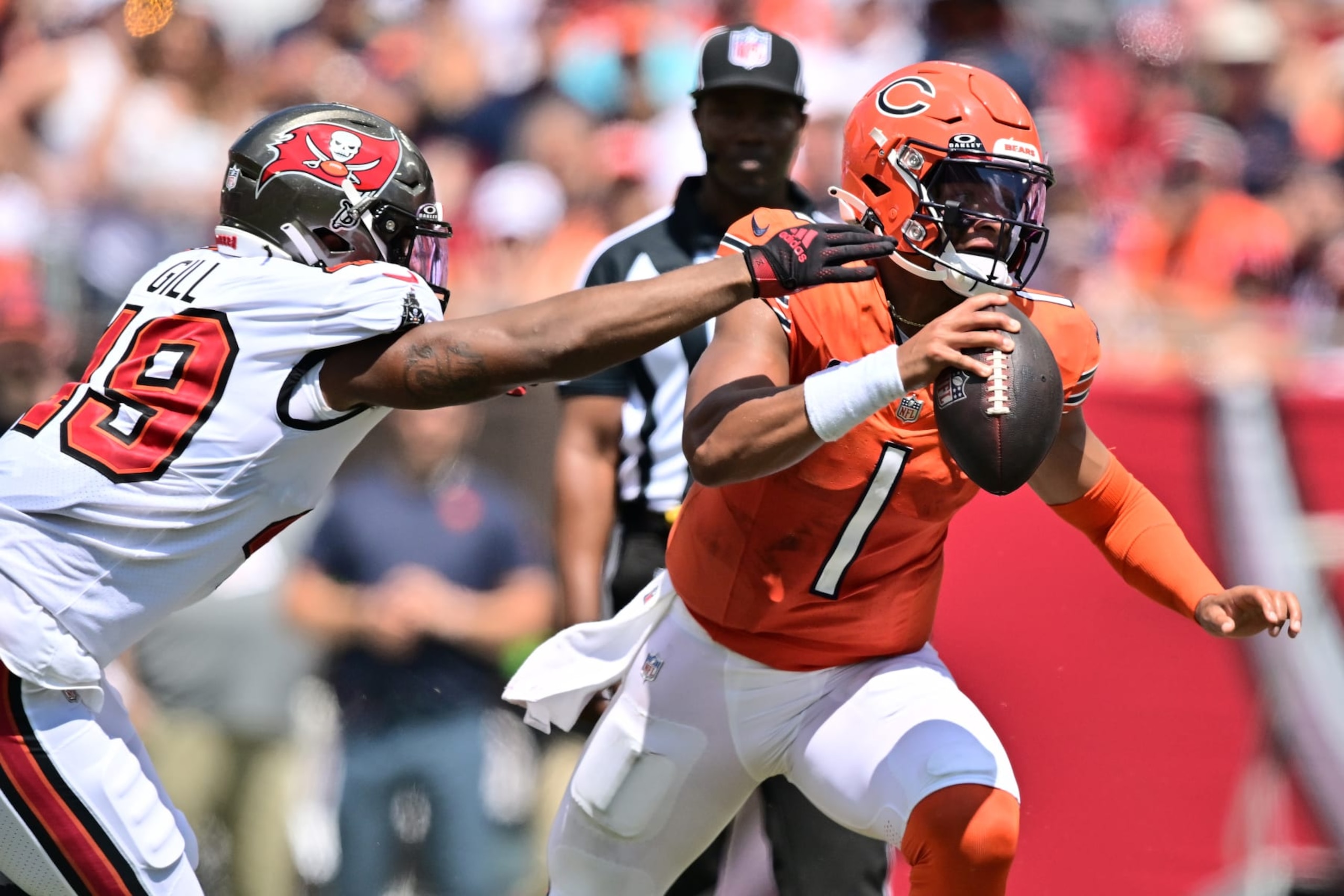 Justin Fields tries to avoid Buccaneers LB Cam Gill.