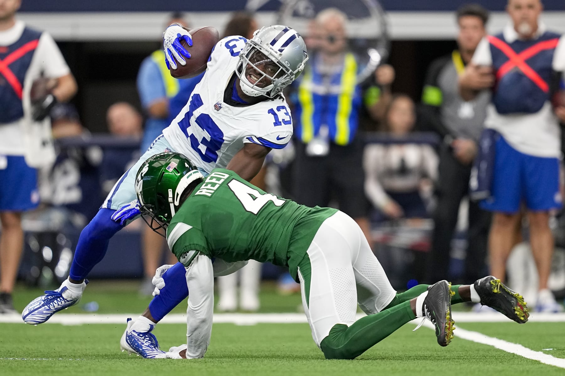 Cowboys WR Michael Gallup is tackled by Jets CB D.J. Reed 