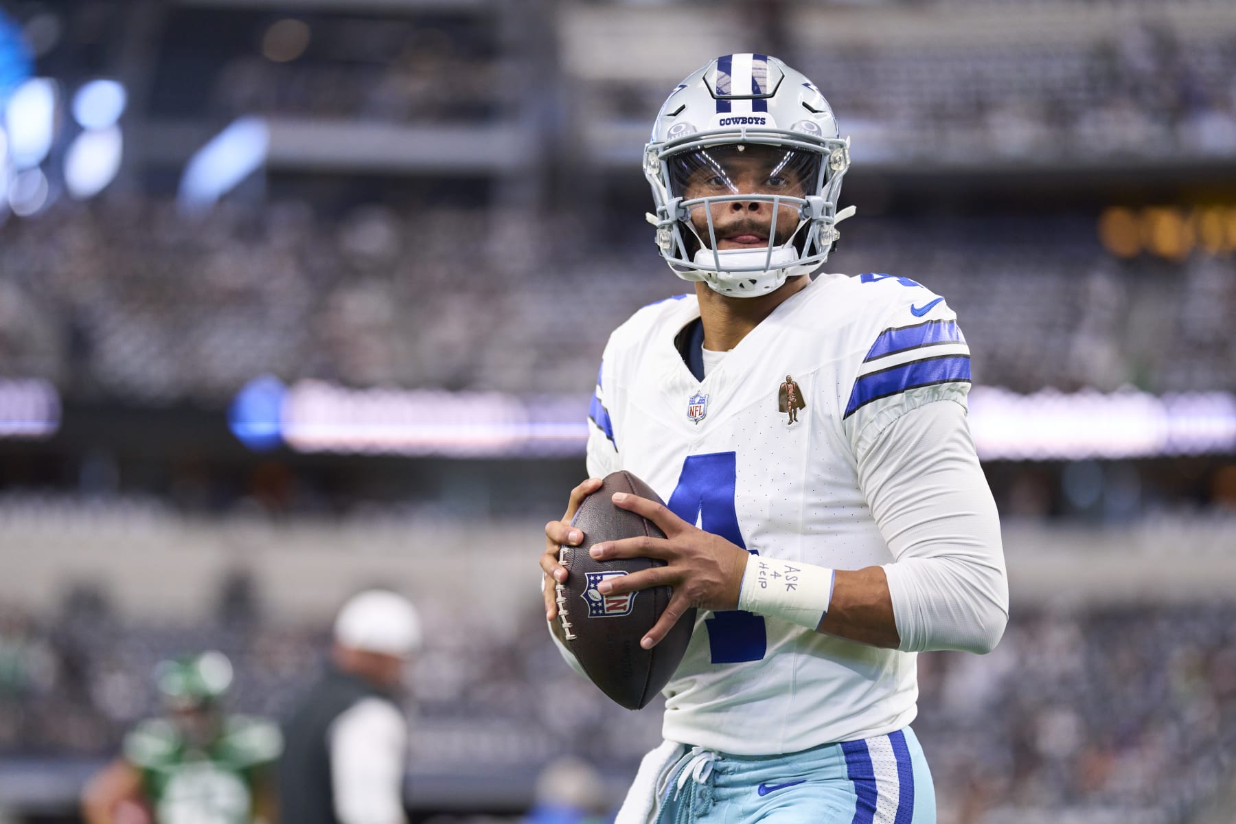 ARLINGTON, TX - SEPTEMBER 17: Dak Prescott #4 of the Dallas Cowboys warms up before kickoff against the New York Jets at AT&T Stadium on September 17, 2023 in Arlington, Texas. (Photo by Cooper Neill/Getty Images)