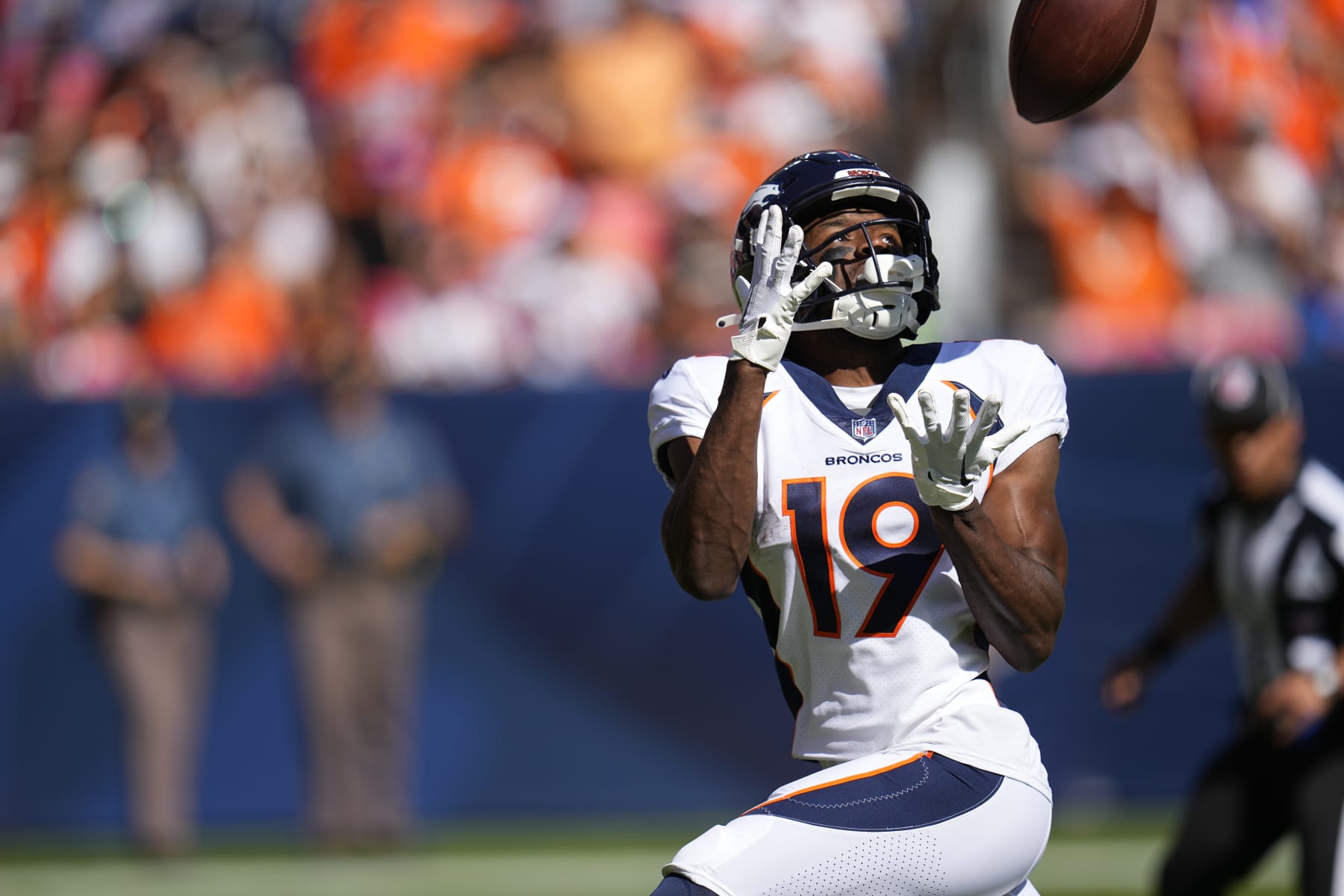 Denver Broncos wide receiver Marvin Mims Jr. catches a pass for a 60-yard touchdown reception against the Washington Commanders in the first half of an NFL football game Sunday, Sept. 17, 2023, in Denver. (AP Photo/Jack Dempsey)