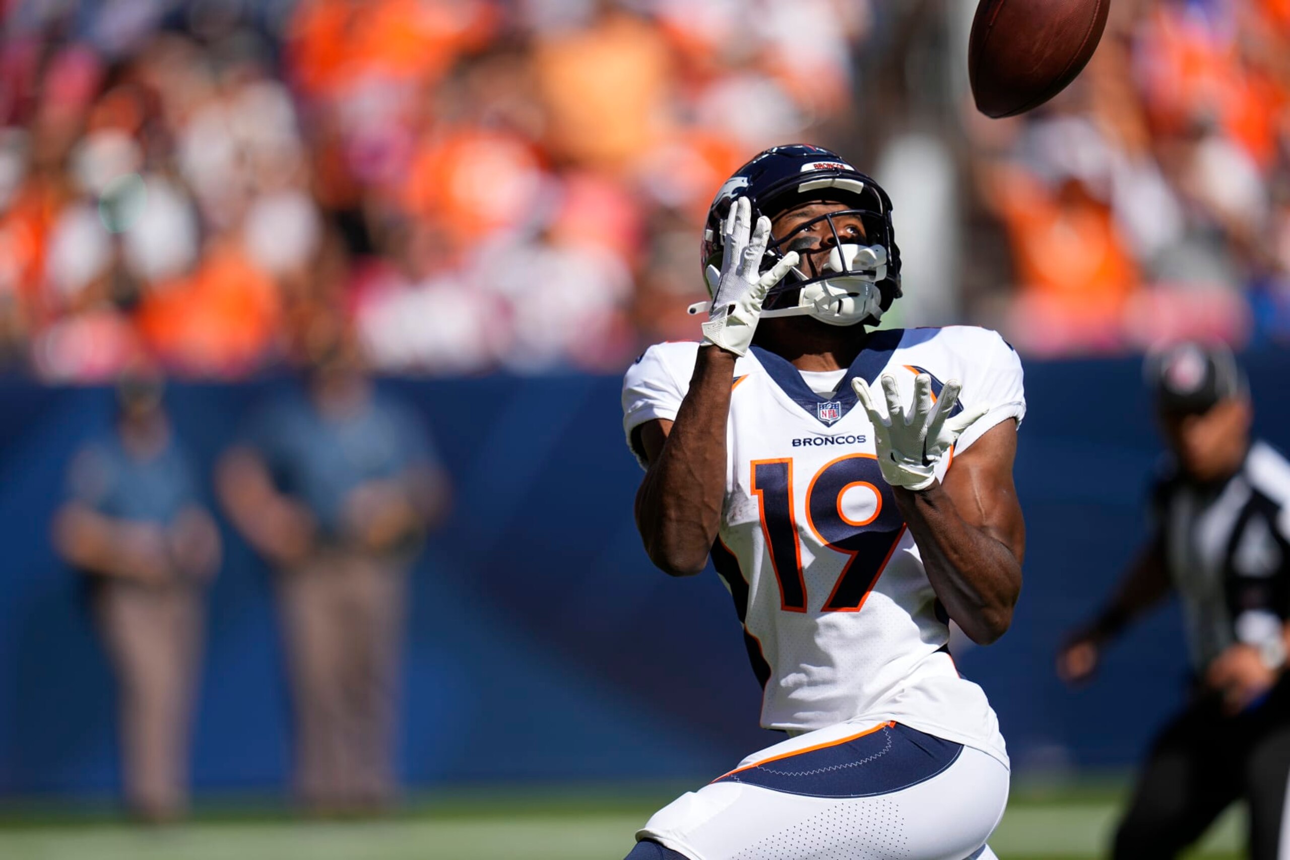 Denver Broncos wide receiver Marvin Mims Jr. catches a pass for a 60-yard touchdown reception against the Washington Commanders in the first half of an NFL football game Sunday, Sept. 17, 2023, in Denver. (AP Photo/Jack Dempsey)