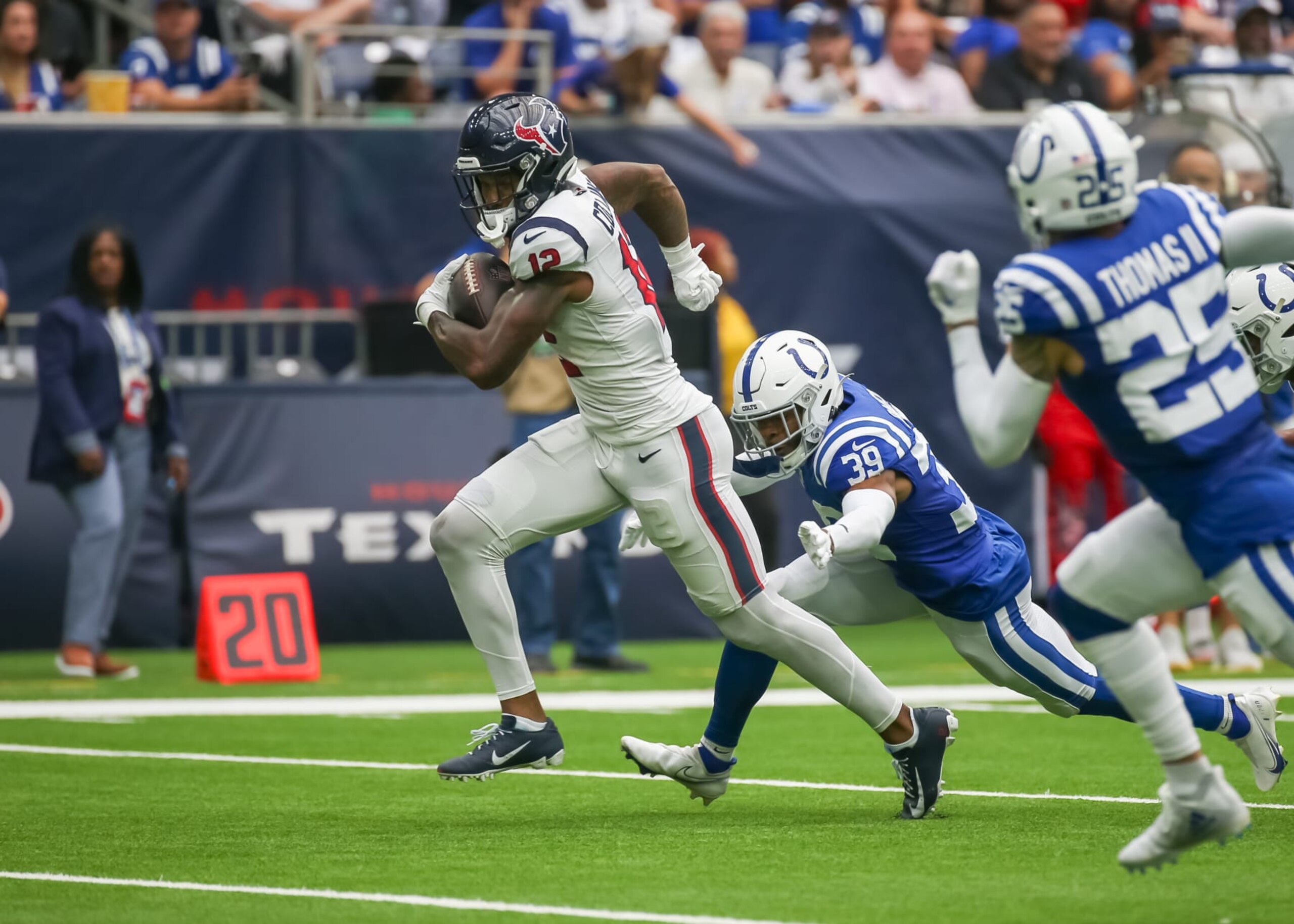 HOUSTON, TX - SEPTEMBER 17: Houston Texans wide receiver Nico Collins (12) carries the ball in the second quarter  during the NFL game between the Indianapolis Colts and Houston Texans on September 17, 2023 at NRG Stadium in Houston, Texas.  (Photo by Leslie Plaza Johnson/Icon Sportswire via Getty Images)