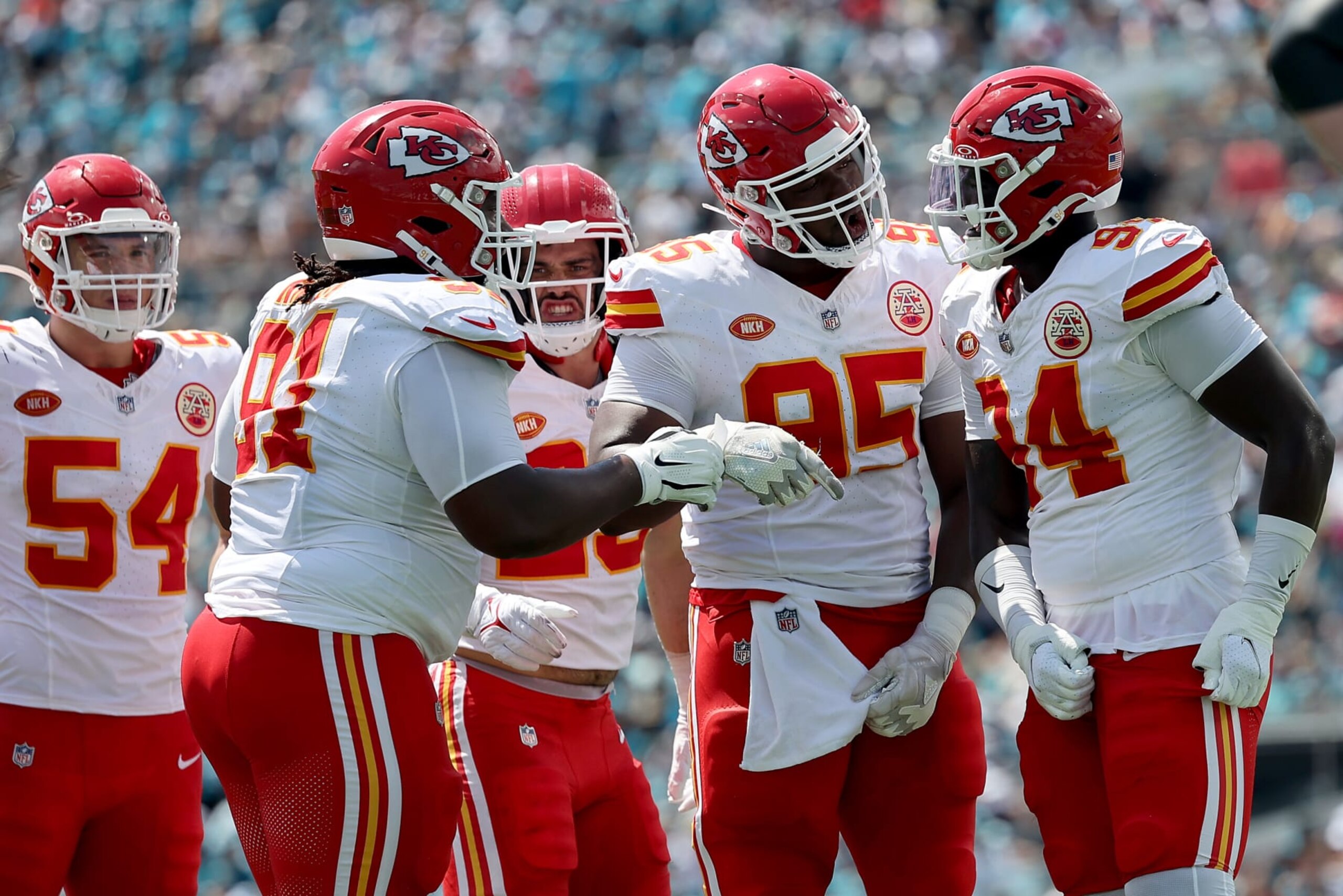 JACKSONVILLE, FLORIDA - SEPTEMBER 17: Chris Jones #95 and Malik Herring #94 of the Kansas City Chiefs react during the second quarter against the Jacksonville Jaguars at TIAA Bank Field on September 17, 2023 in Jacksonville, Florida. (Photo by Mike Carlson/Getty Images)