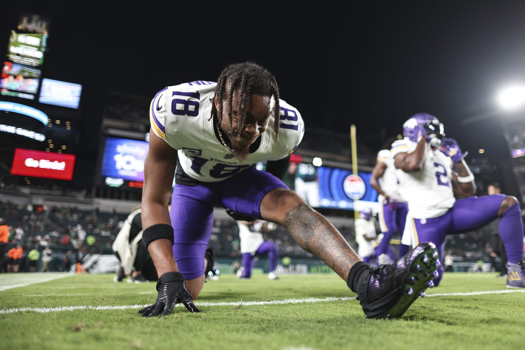PHILADELPHIA, PENNSYLVANIA - SEPTEMBER 14: Justin Jefferson #18 of the Minnesota Vikings stretches as he warms up prior to an NFL football game between the Philadelphia Eagles and the Minnesota Vikings at Lincoln Financial Field on September 14, 2023 in Philadelphia, Pennsylvania. (Photo by Michael Owens/Getty Images)