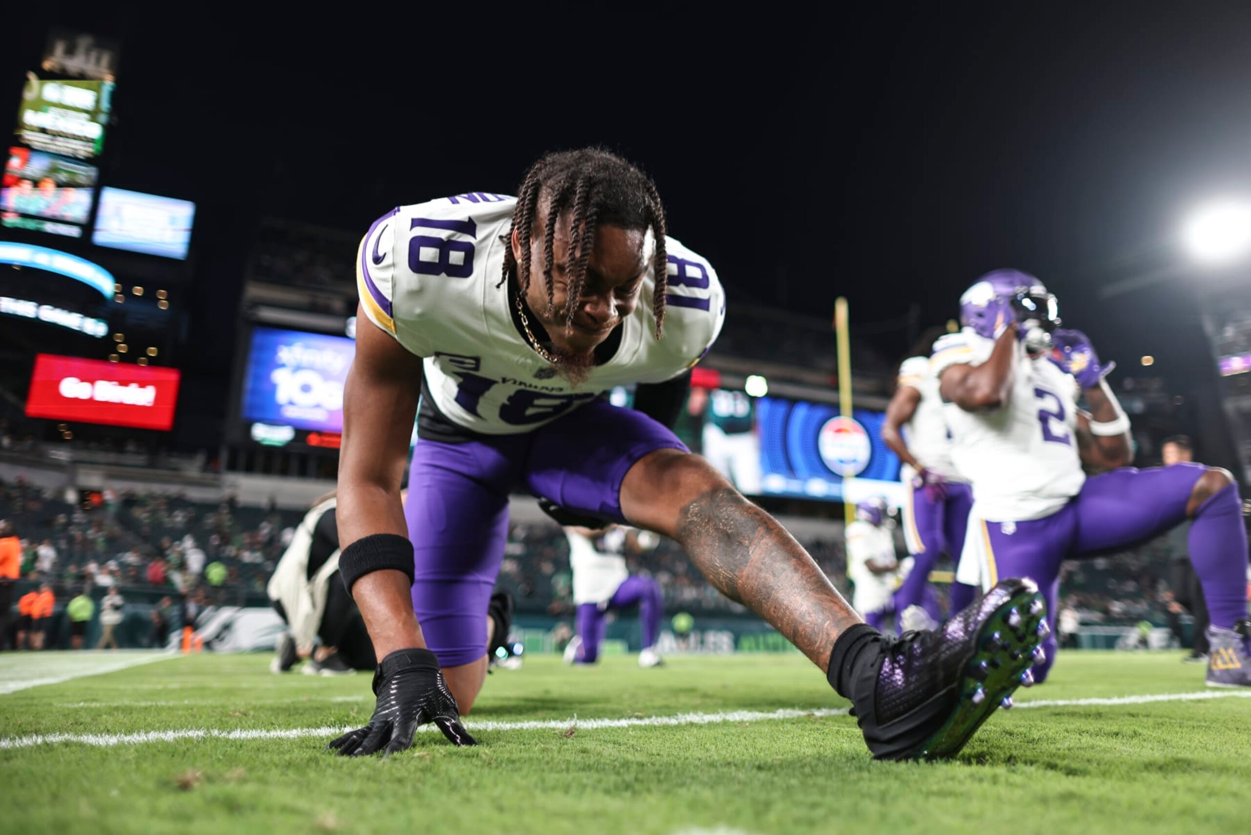 PHILADELPHIA, PENNSYLVANIA - SEPTEMBER 14: Justin Jefferson #18 of the Minnesota Vikings stretches as he warms up prior to an NFL football game between the Philadelphia Eagles and the Minnesota Vikings at Lincoln Financial Field on September 14, 2023 in Philadelphia, Pennsylvania. (Photo by Michael Owens/Getty Images)
