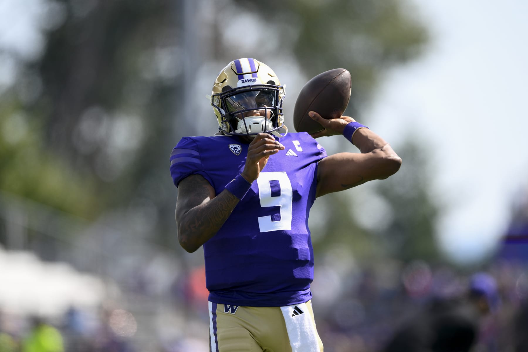 SEATTLE, WASHINGTON - SEPTEMBER 02: Michael Penix Jr. #9 of the Washington Huskies warms up before the game against the Boise State Broncos at Husky Stadium on September 02, 2023 in Seattle, Washington. (Photo by Alika Jenner/Getty Images)