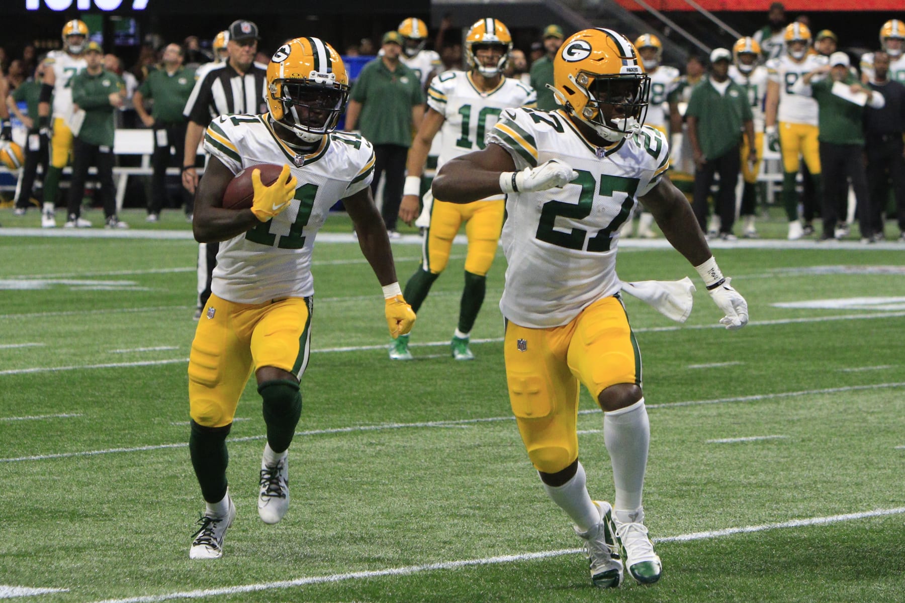 ATLANTA, GA - SEPTEMBER 17: Green Bay Packers wide receiver Jayden Reed #11 attempts to score during the NFL game between the Green Bay Packers and the Atlanta Falcons on September 17, 2023 at Mercedes-Benz Stadium in Atlanta, GA.  (Photo by Jeff Robinson/Icon Sportswire via Getty Images)