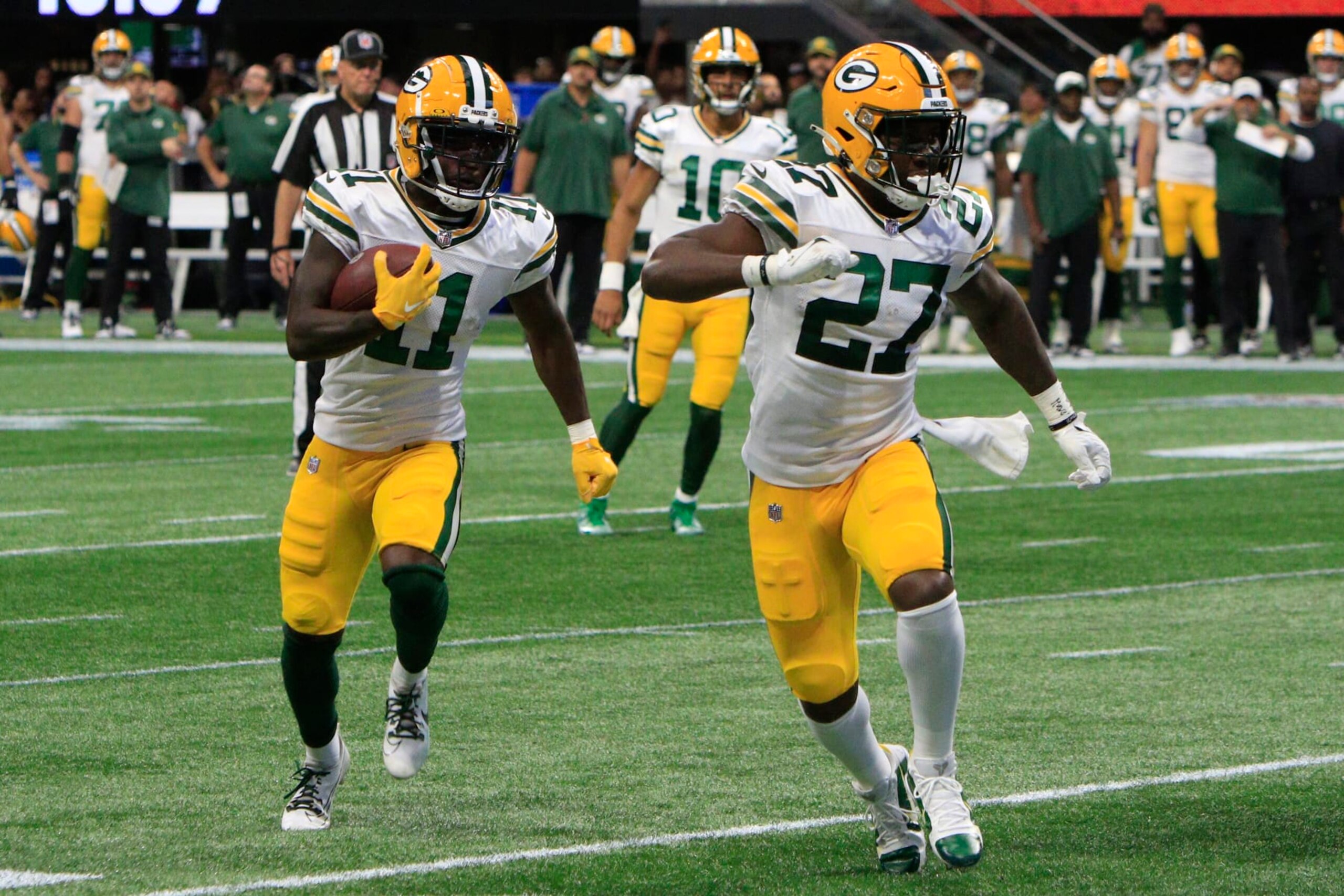 ATLANTA, GA - SEPTEMBER 17: Green Bay Packers wide receiver Jayden Reed #11 attempts to score during the NFL game between the Green Bay Packers and the Atlanta Falcons on September 17, 2023 at Mercedes-Benz Stadium in Atlanta, GA.  (Photo by Jeff Robinson/Icon Sportswire via Getty Images)