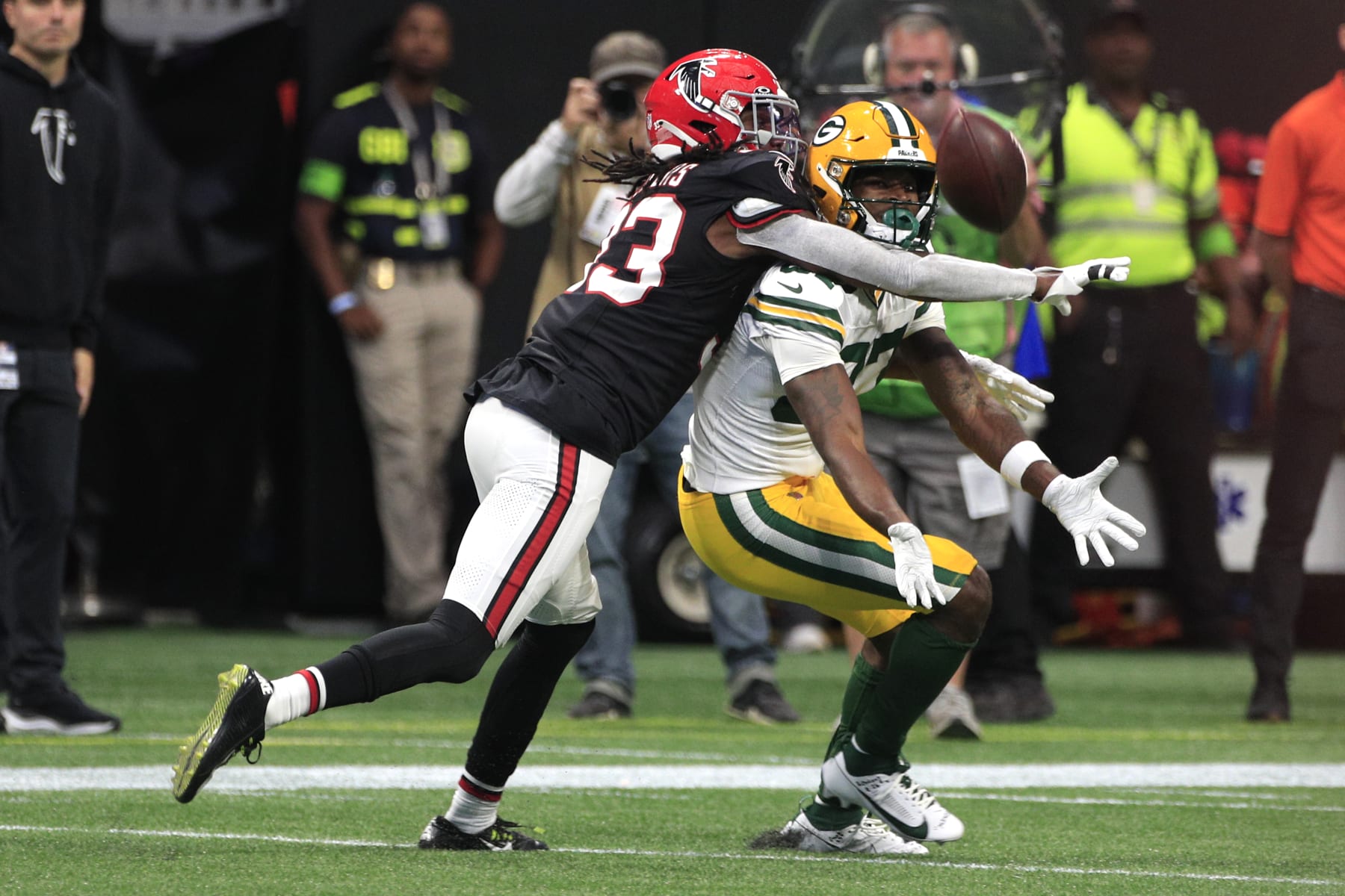 ATLANTA, GA - SEPTEMBER 17: Atlanta Falcons cornerback Tre Flowers #33  breaks up a pass intended for Green Bay Packers running back Patrick Taylor #27 during the NFL game between the Green Bay Packers and the Atlanta Falcons on September 17, 2023 at Mercedes-Benz Stadium in Atlanta, GA.  (Photo by Jeff Robinson/Icon Sportswire via Getty Images)