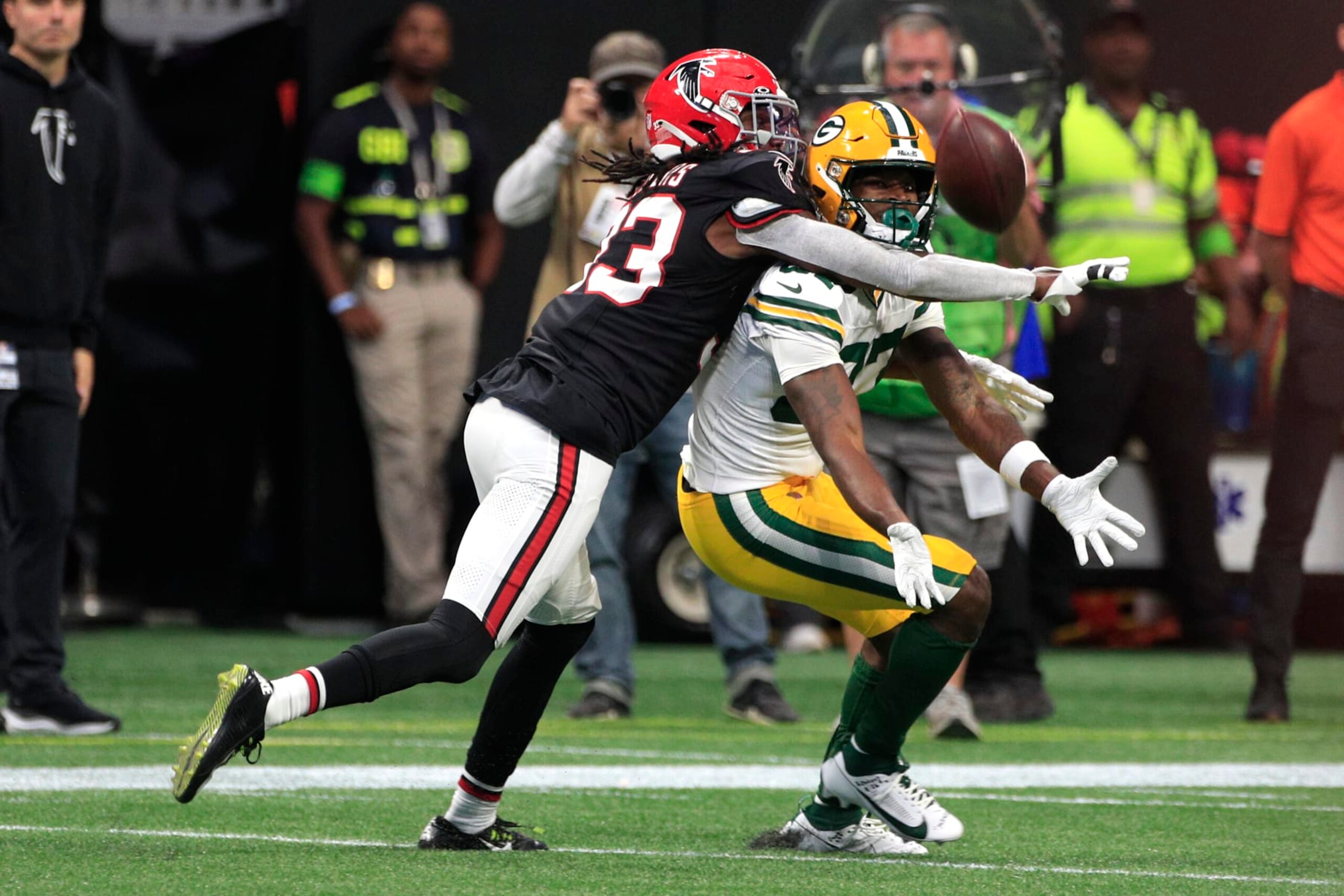 ATLANTA, GA - SEPTEMBER 17: Atlanta Falcons cornerback Tre Flowers #33  breaks up a pass intended for Green Bay Packers running back Patrick Taylor #27 during the NFL game between the Green Bay Packers and the Atlanta Falcons on September 17, 2023 at Mercedes-Benz Stadium in Atlanta, GA.  (Photo by Jeff Robinson/Icon Sportswire via Getty Images)