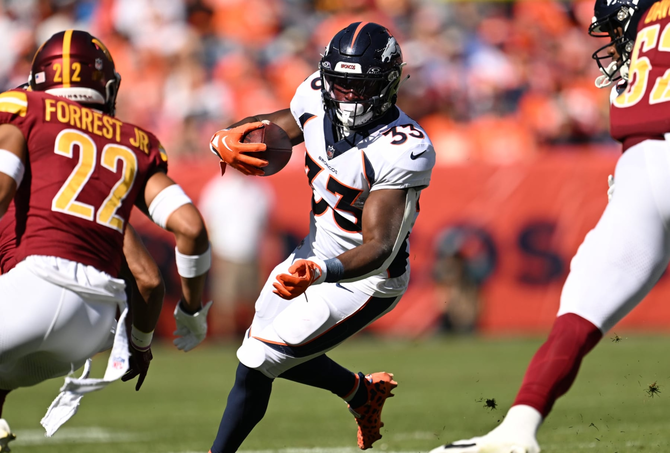 DENVER, COLORADO - SEPTEMBER 17: Denver Broncos running back Javonte Williams (33) rushes the ball up the field during the first half of the game at Empower Field at Mile High on September 17, 2023 in Denver, Colorado. The Denver Broncos took on the Washington Commanders during week 2 of the 2023 NFL season. (Photo by RJ Sangosti/MediaNews Group/The Denver Post via Getty Images)
