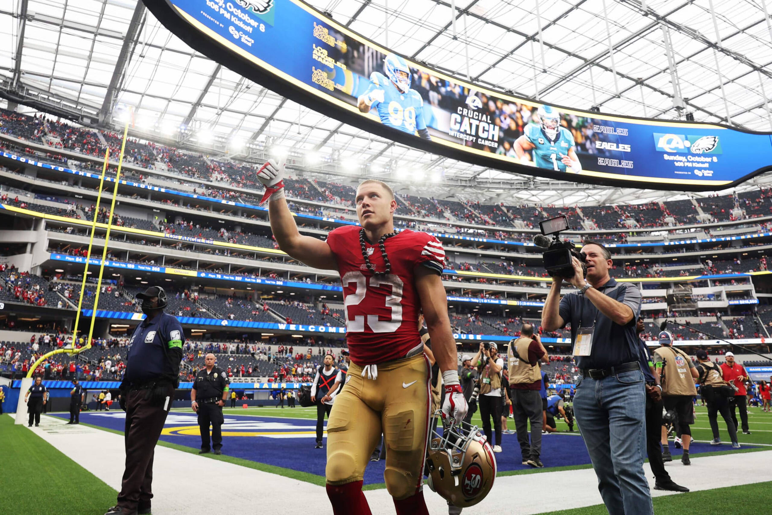 INGLEWOOD, CALIFORNIA - SEPTEMBER 17: Christian McCaffrey #23 of the San Francisco 49ers waves to fans as he leaves the field after the game against the Los Angeles Rams at SoFi Stadium on September 17, 2023 in Inglewood, California. (Photo by Harry How/Getty Images)