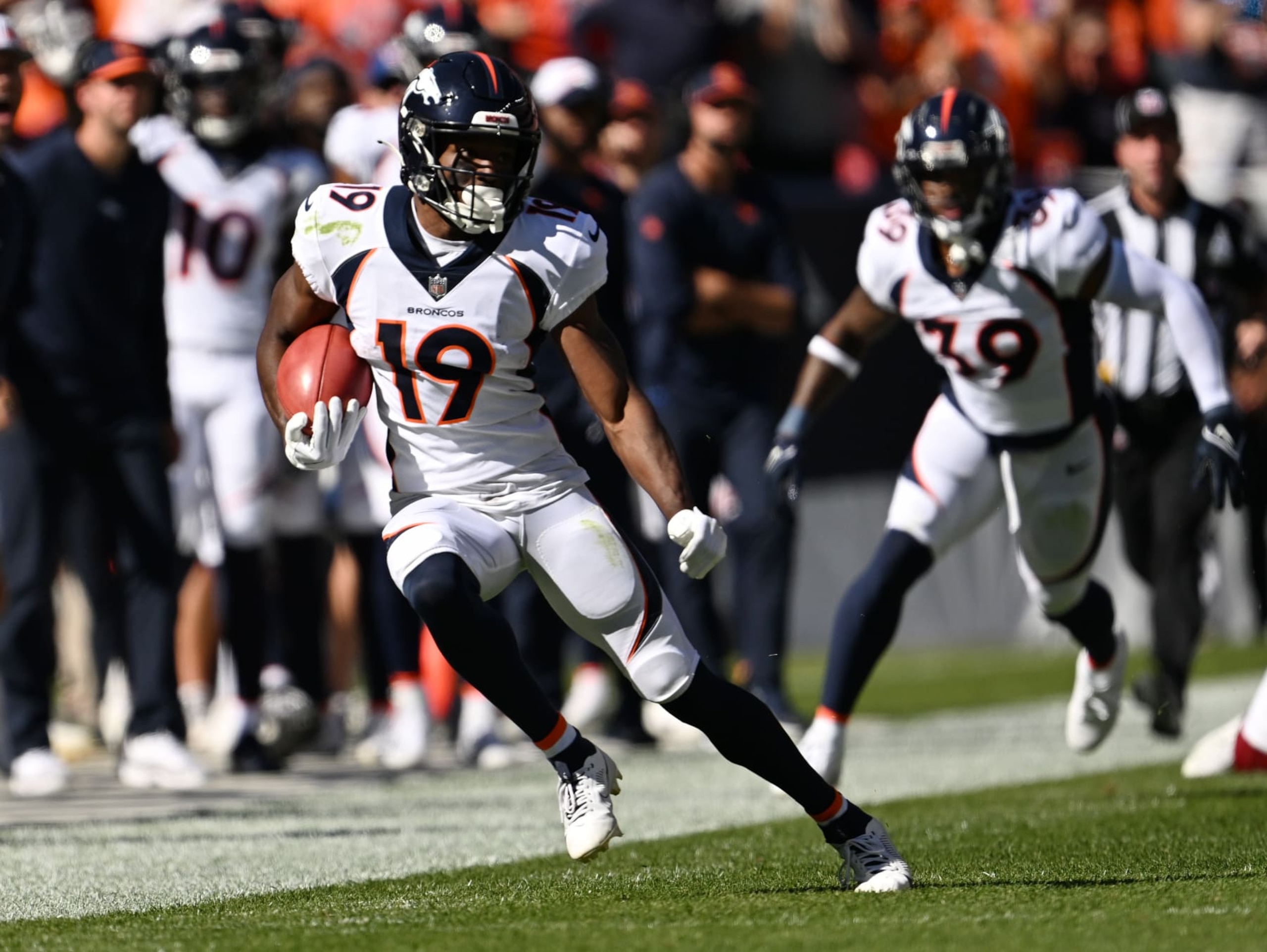 DENVER, COLORADO - SEPTEMBER 17: Denver Broncos wide receiver Marvin Mims Jr. (19) has a 50-yard return during the first half of the game at Empower Field at Mile High on September 17, 2023 in Denver, Colorado. The Denver Broncos took on the Washington Commanders during week 2 of the 2023 NFL season. (Photo by RJ Sangosti/MediaNews Group/The Denver Post via Getty Images)