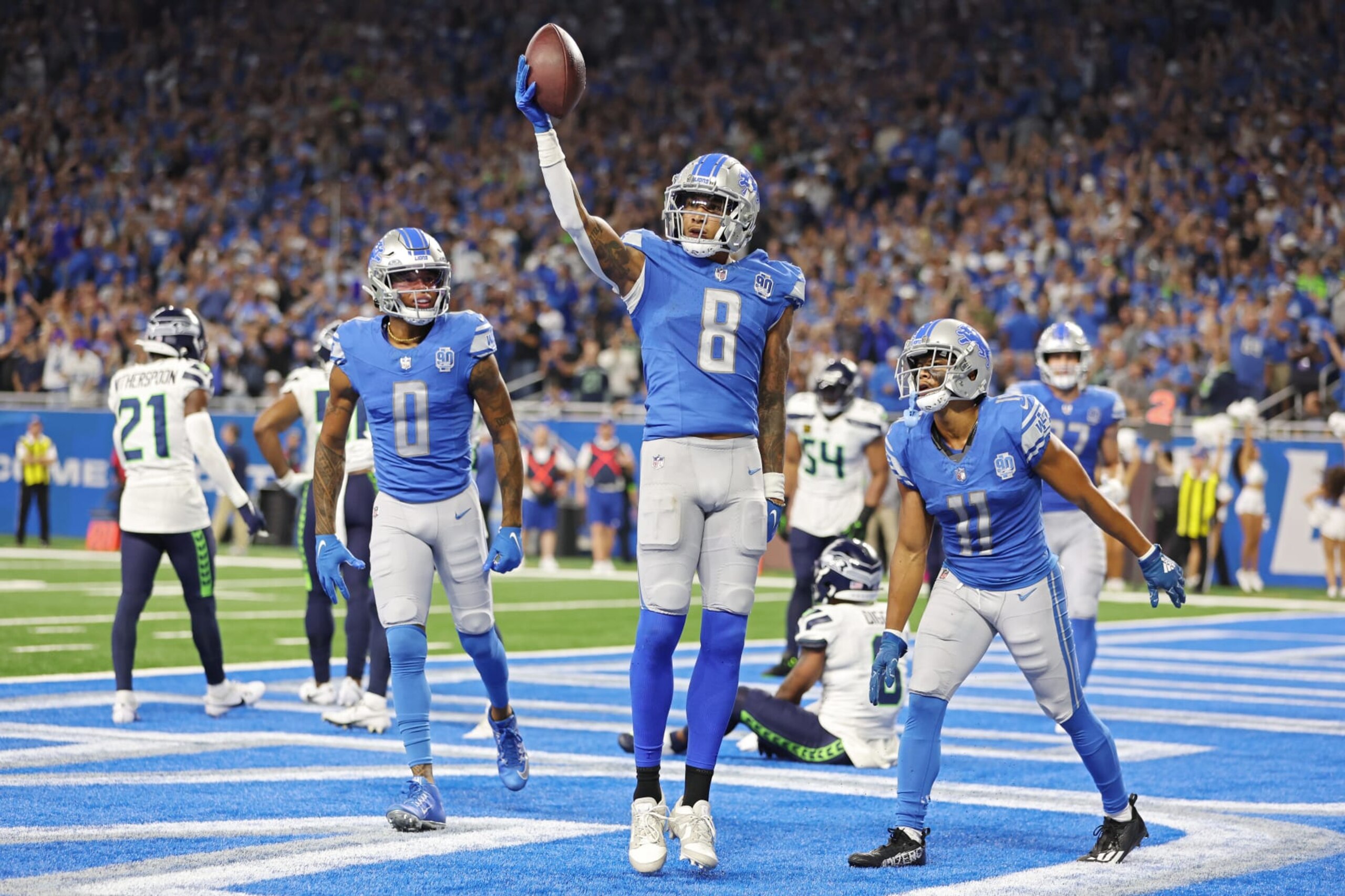 DETROIT, MICHIGAN - SEPTEMBER 17: Josh Reynolds #8 of the Detroit Lions celebrates a touchdown during the fourth quarter in the game against the Seattle Seahawks at Ford Field on September 17, 2023 in Detroit, Michigan. (Photo by Gregory Shamus/Getty Images) DETROIT, MICHIGAN - SEPTEMBER 17: Josh Reynolds #8 of the Detroit Lions celebrates a touchdown during the fourth quarter in the game against the Seattle Seahawks at Ford Field on September 17, 2023 in Detroit, Michigan. (Photo by Gregory Shamus/Getty Images)