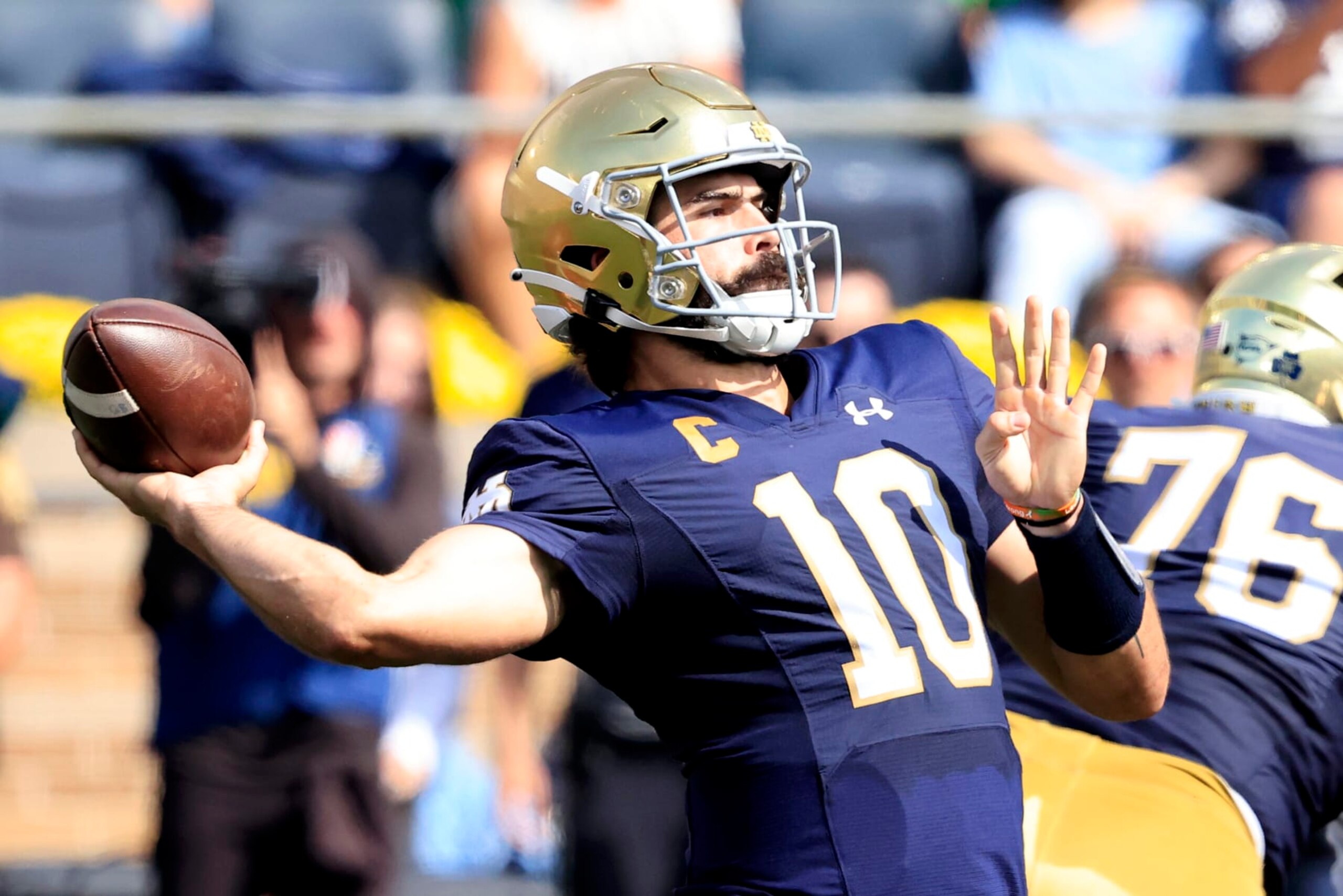 SOUTH BEND, INDIANA - SEPTEMBER 16: Sam Hartman #10 of the Notre Dame Fighting Irish throws a touchdown pass during the first half in the game against the Central Michigan Chippewas at Notre Dame Stadium on September 16, 2023 in South Bend, Indiana. (Photo by Justin Casterline/Getty Images) SOUTH BEND, INDIANA - SEPTEMBER 16: Sam Hartman #10 of the Notre Dame Fighting Irish throws a touchdown pass during the first half in the game against the Central Michigan Chippewas at Notre Dame Stadium on September 16, 2023 in South Bend, Indiana. (Photo by Justin Casterline/Getty Images)