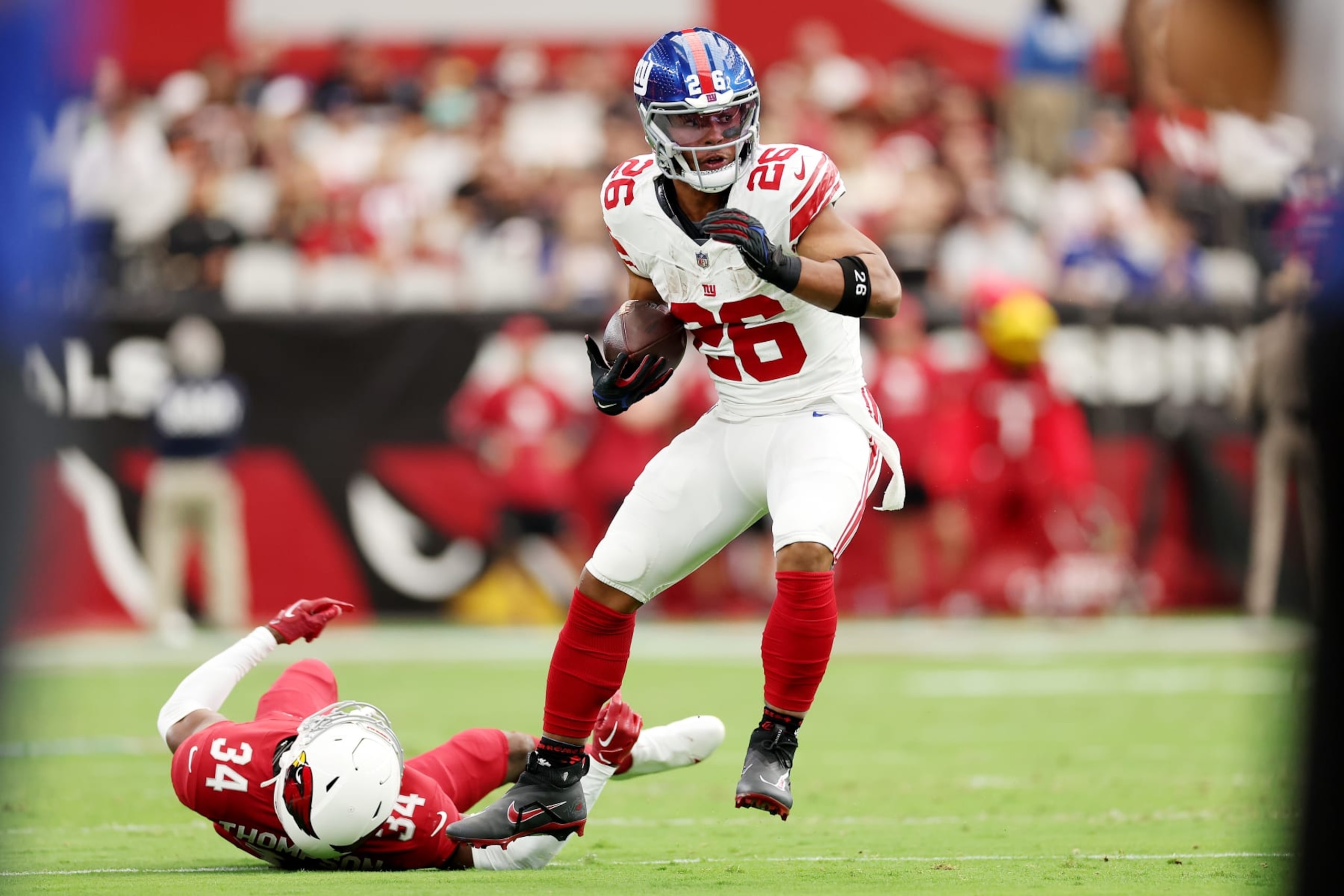 GLENDALE, ARIZONA - SEPTEMBER 17: Saquon Barkley #26 of the New York Giants runs the ball during the first quarter in the game against the Arizona Cardinals at State Farm Stadium on September 17, 2023 in Glendale, Arizona. (Photo by Christian Petersen/Getty Images) GLENDALE, ARIZONA - SEPTEMBER 17: Saquon Barkley #26 of the New York Giants runs the ball during the first quarter in the game against the Arizona Cardinals at State Farm Stadium on September 17, 2023 in Glendale, Arizona. (Photo by Christian Petersen/Getty Images)